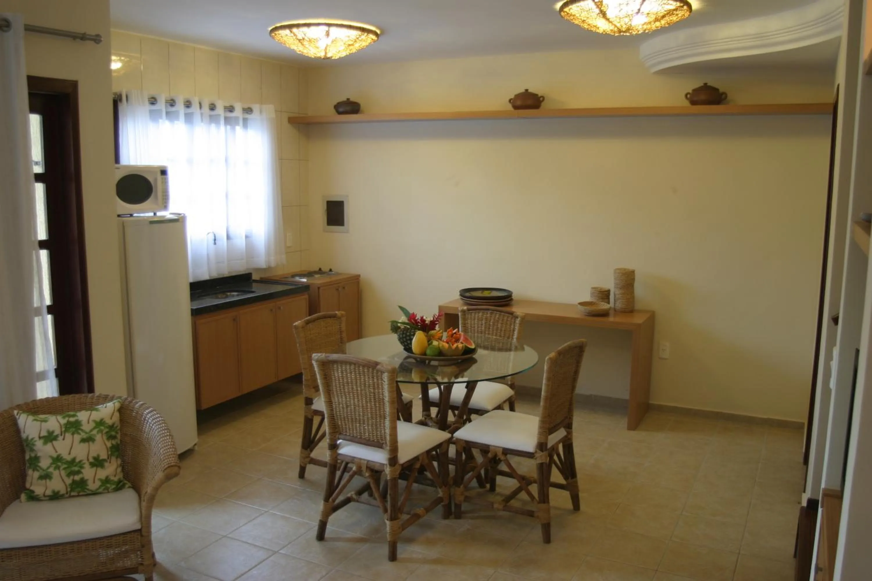 Kitchen or kitchenette in CostaSol Pipa Chalés