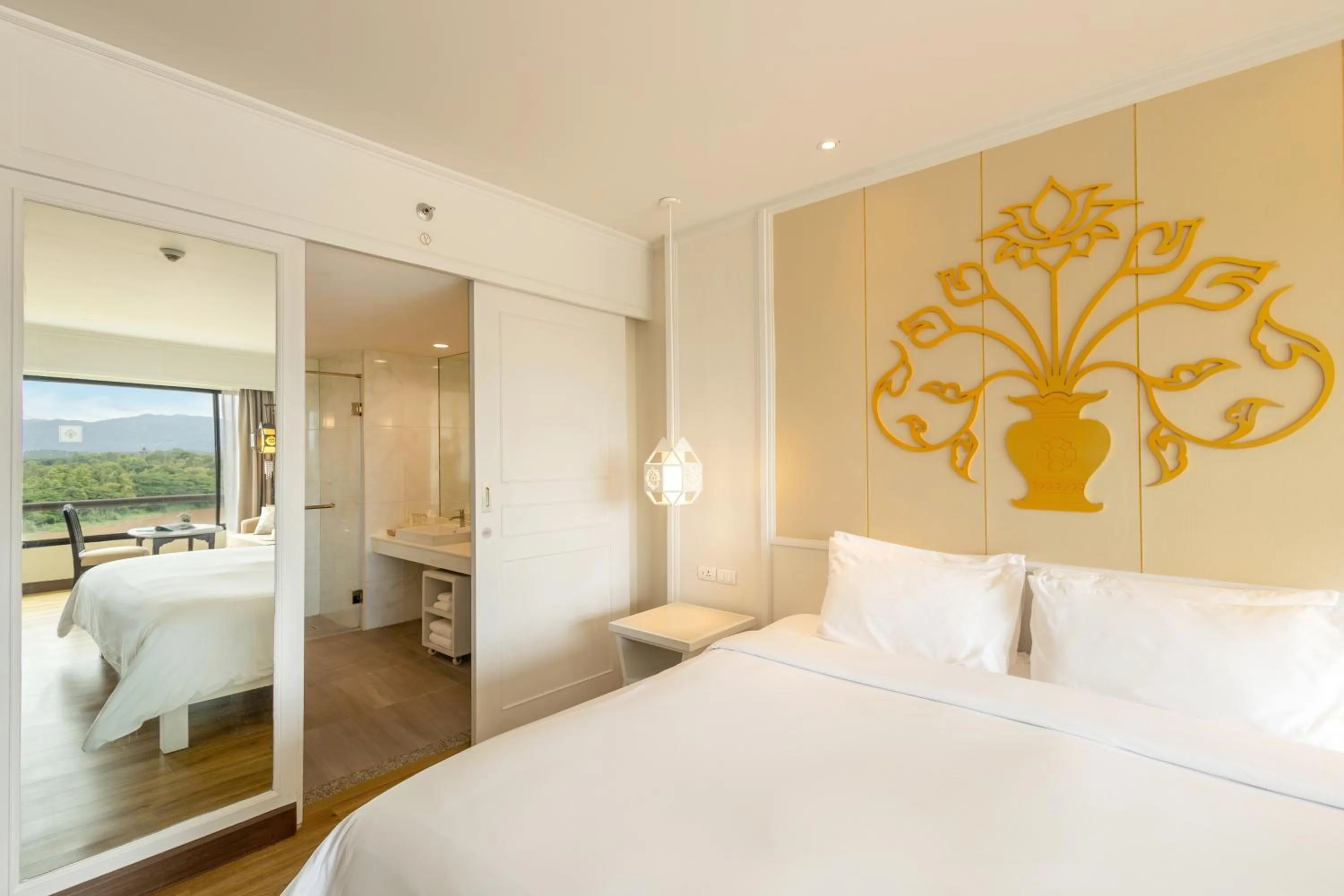 Bed in The Riverie by Katathani