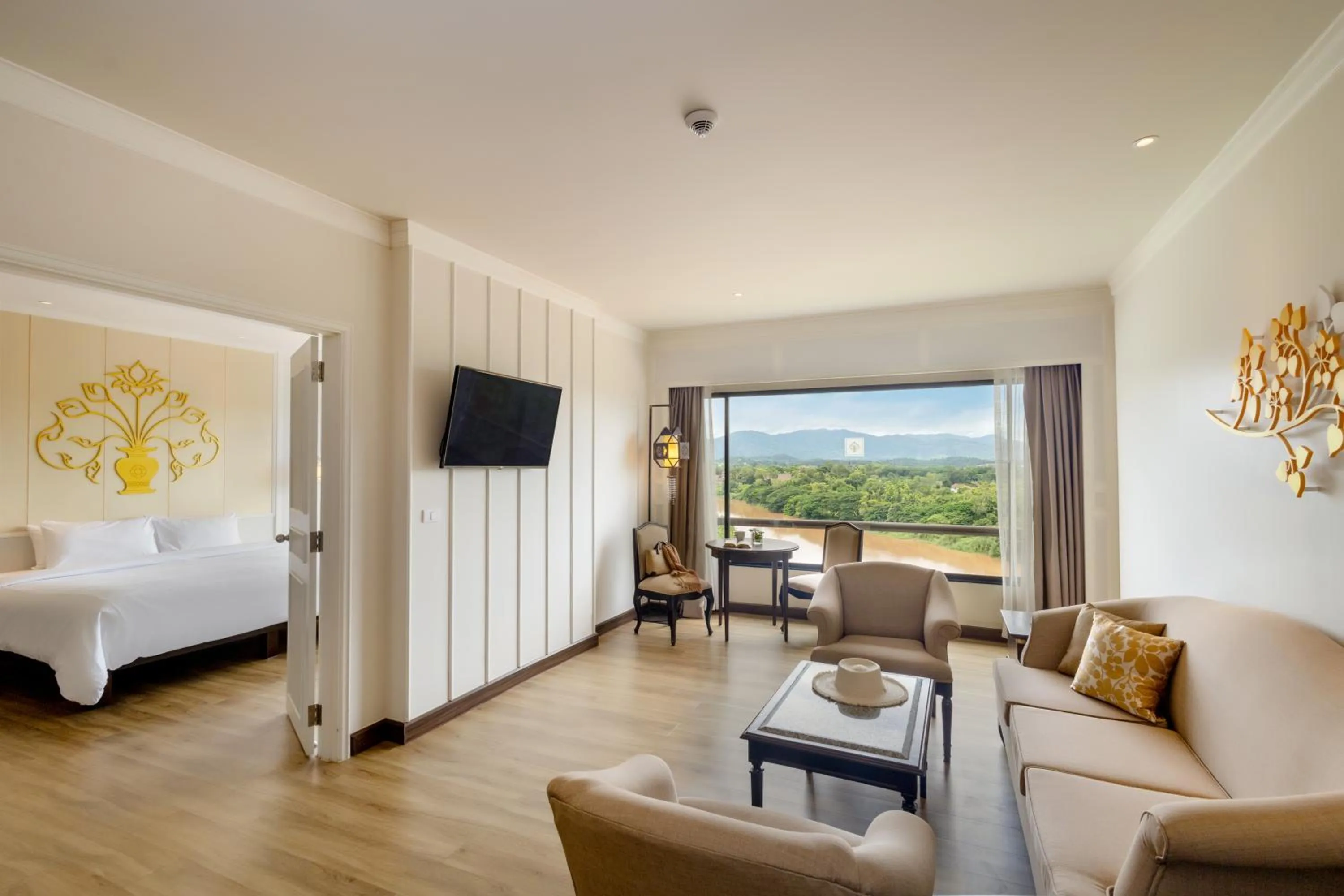 Living room, Bed in The Riverie by Katathani