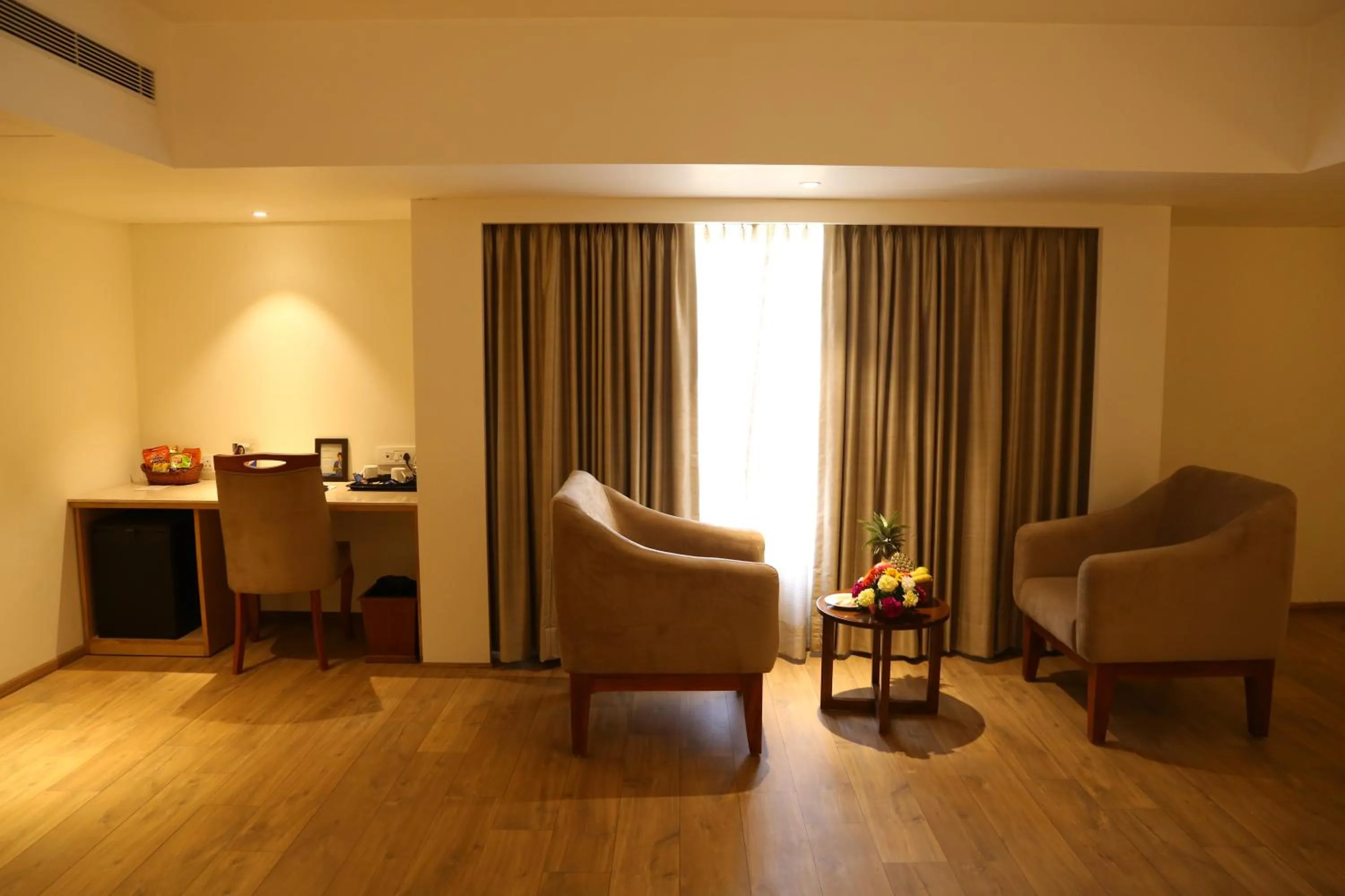 Seating area in Sarovar Portico Rivera Ahmedabad