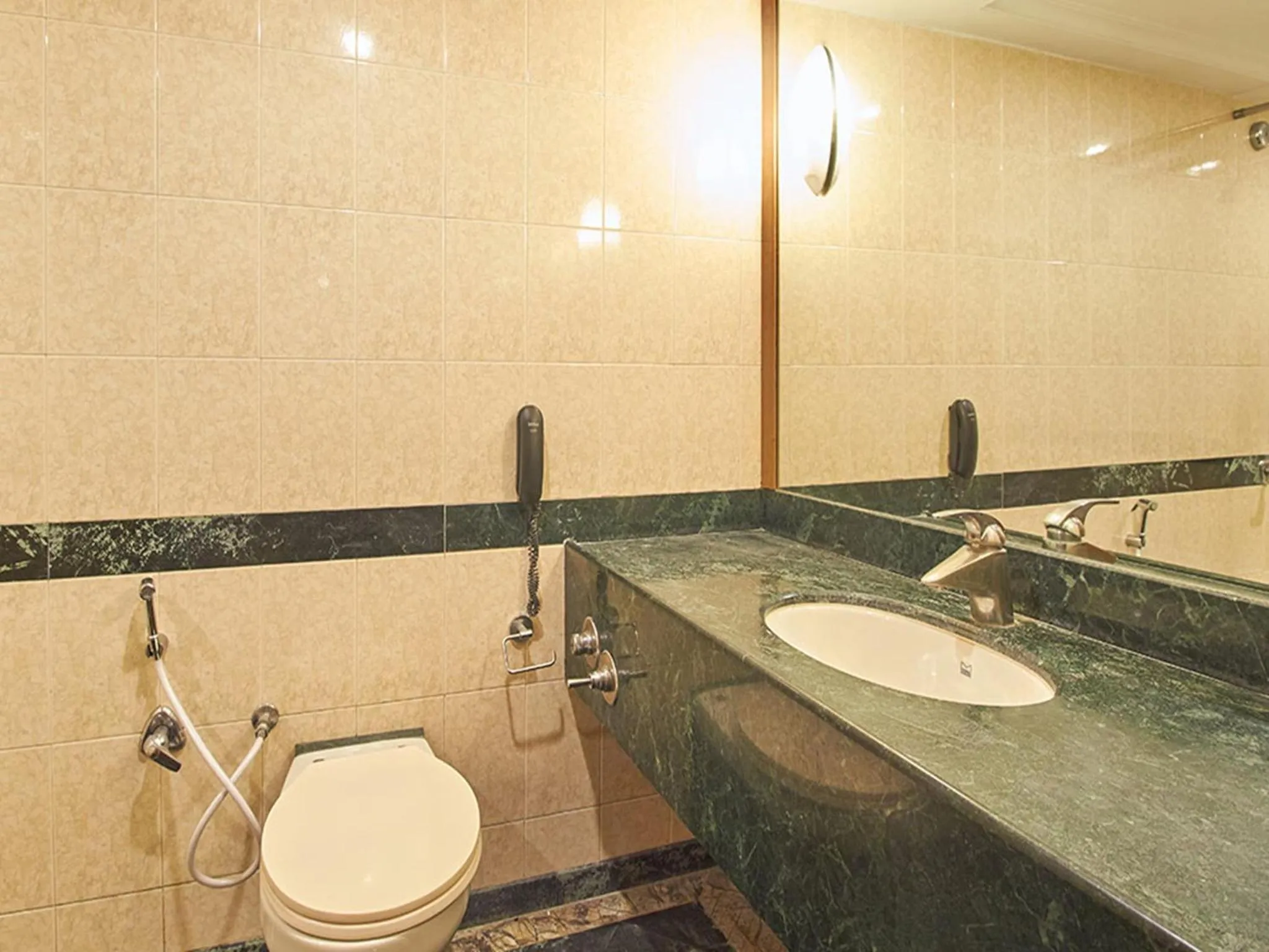 Bathroom in Sarovar Portico Rivera Ahmedabad