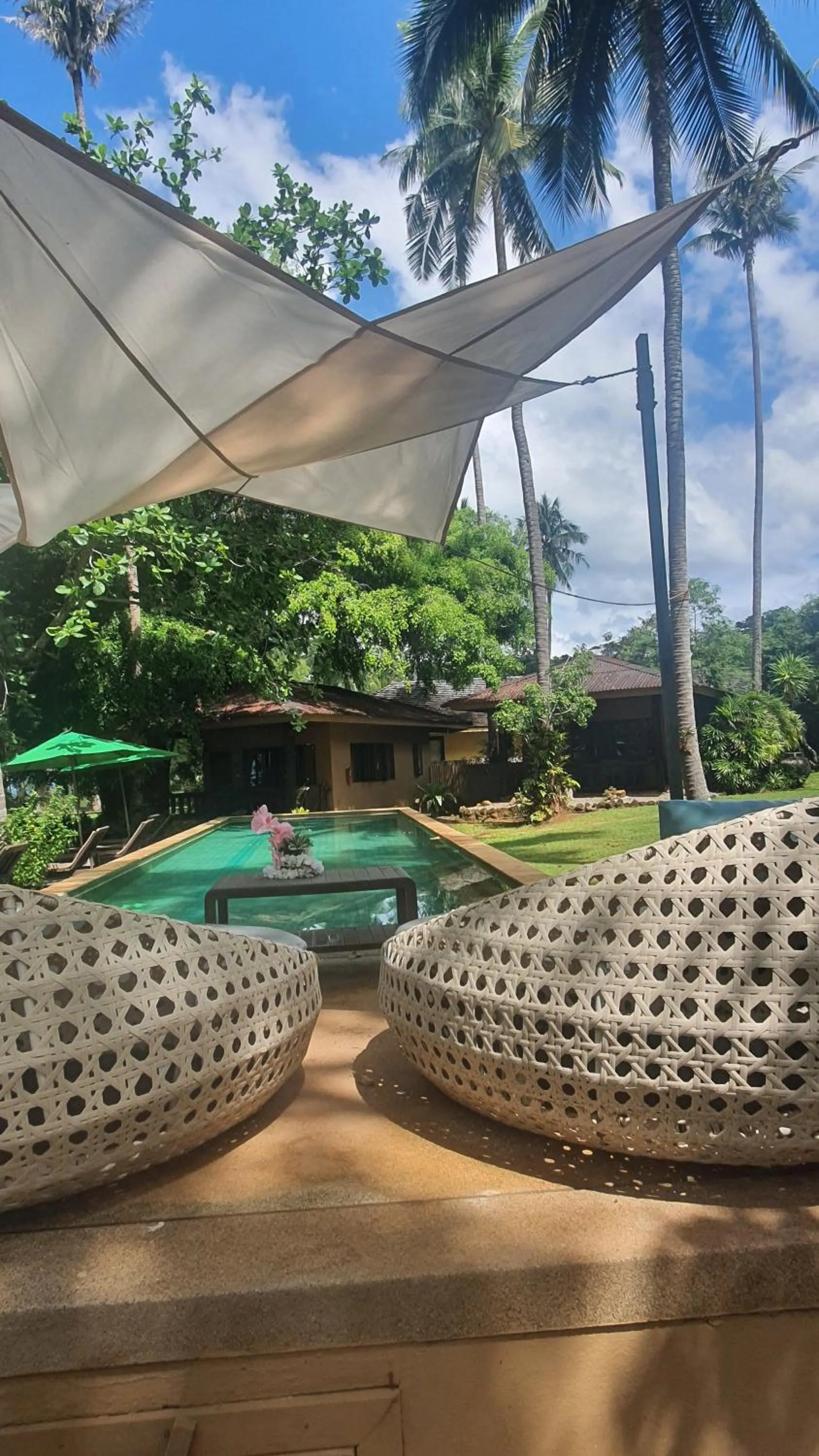Swimming pool in Melina Beach Front Bungalows