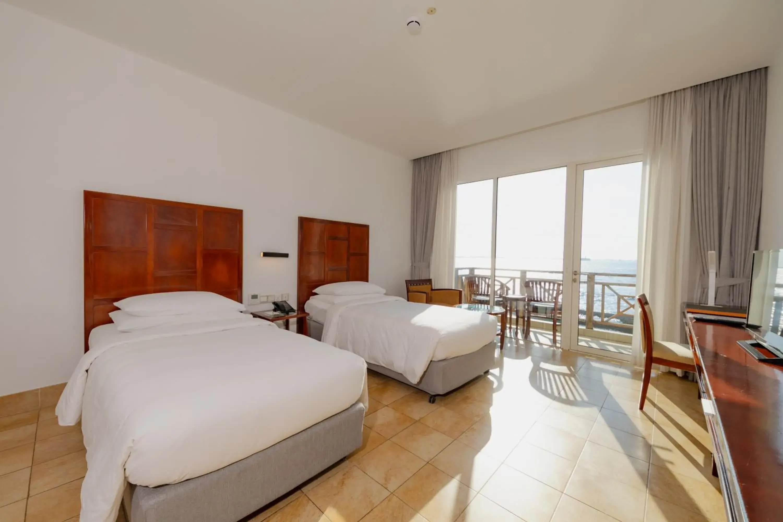 Photo of the whole room, Bed in Hulhule Island Hotel- Private Beach Access & Airport Pick-up and Drop Photo of the whole room, Bed in Hulhule Island Hotel- Private Beach Access & Airport Pick-up and Drop