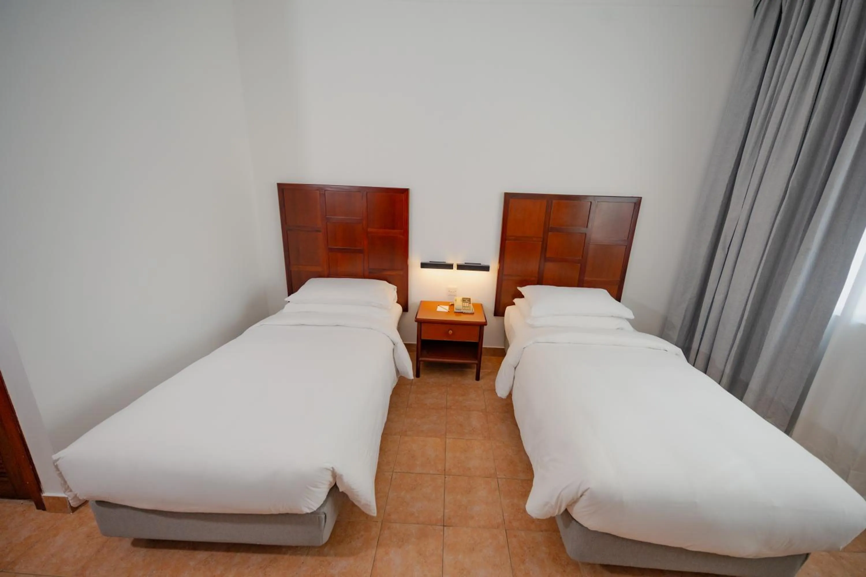 Bed in Hulhule Island Hotel- Private Beach Access & Airport Pick-up and Drop