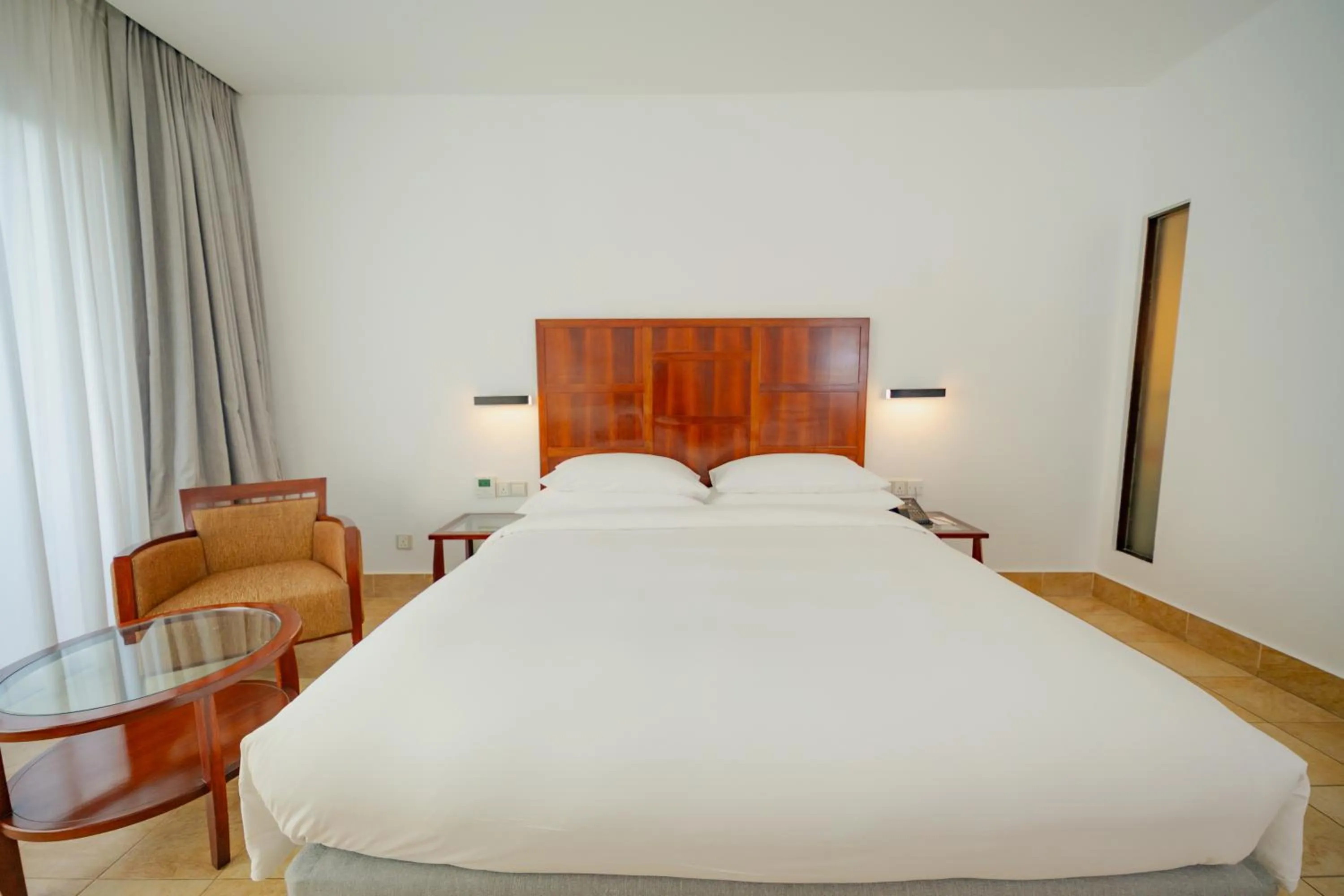 Bed in Hulhule Island Hotel- Private Beach Access & Airport Pick-up and Drop