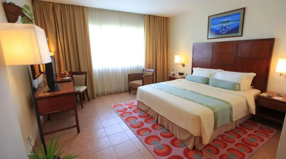 Bed in Hulhule Island Hotel- Private Beach Access & Airport Pick-up and Drop