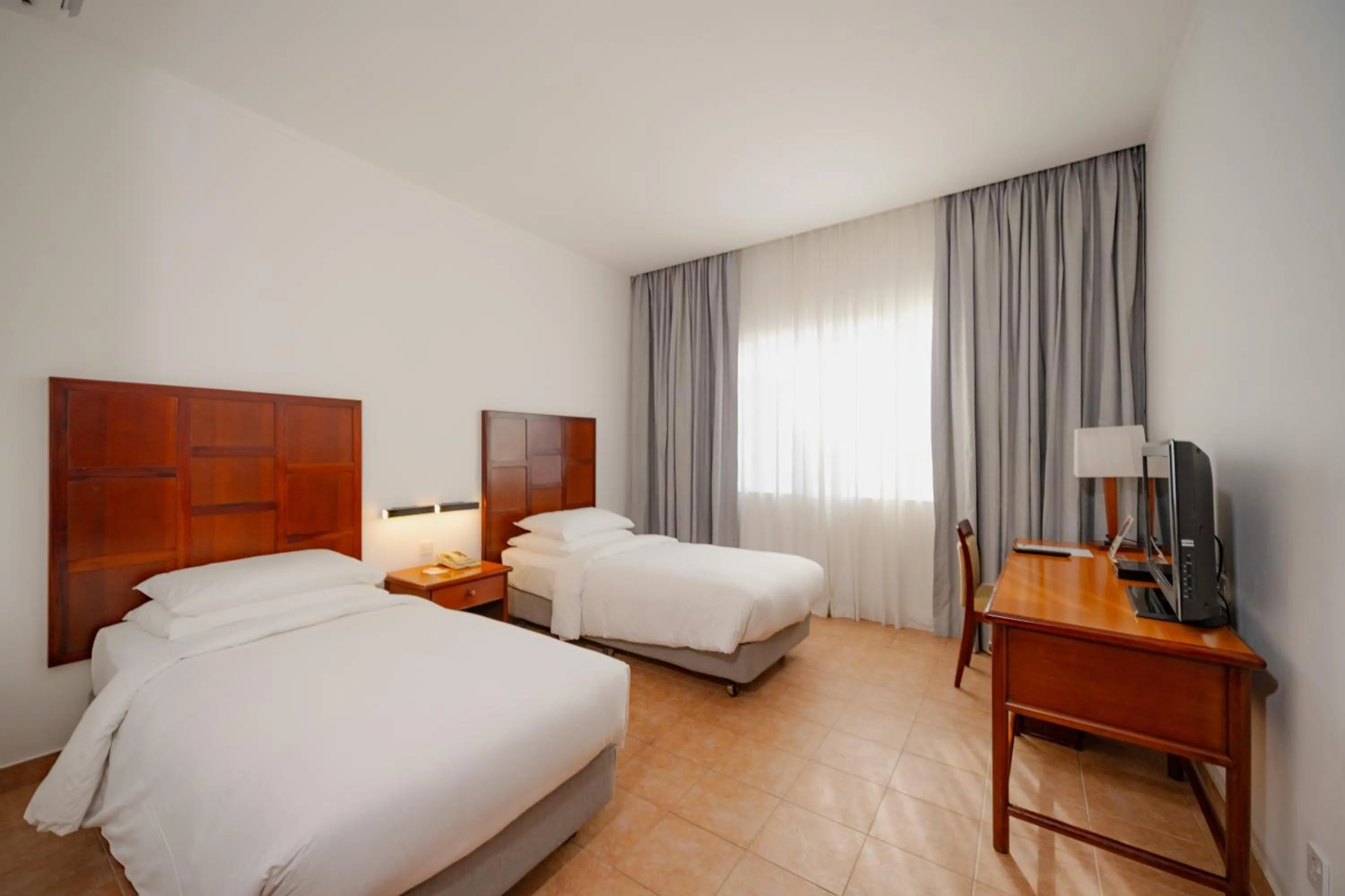 Bed in Hulhule Island Hotel- Private Beach Access & Airport Pick-up and Drop