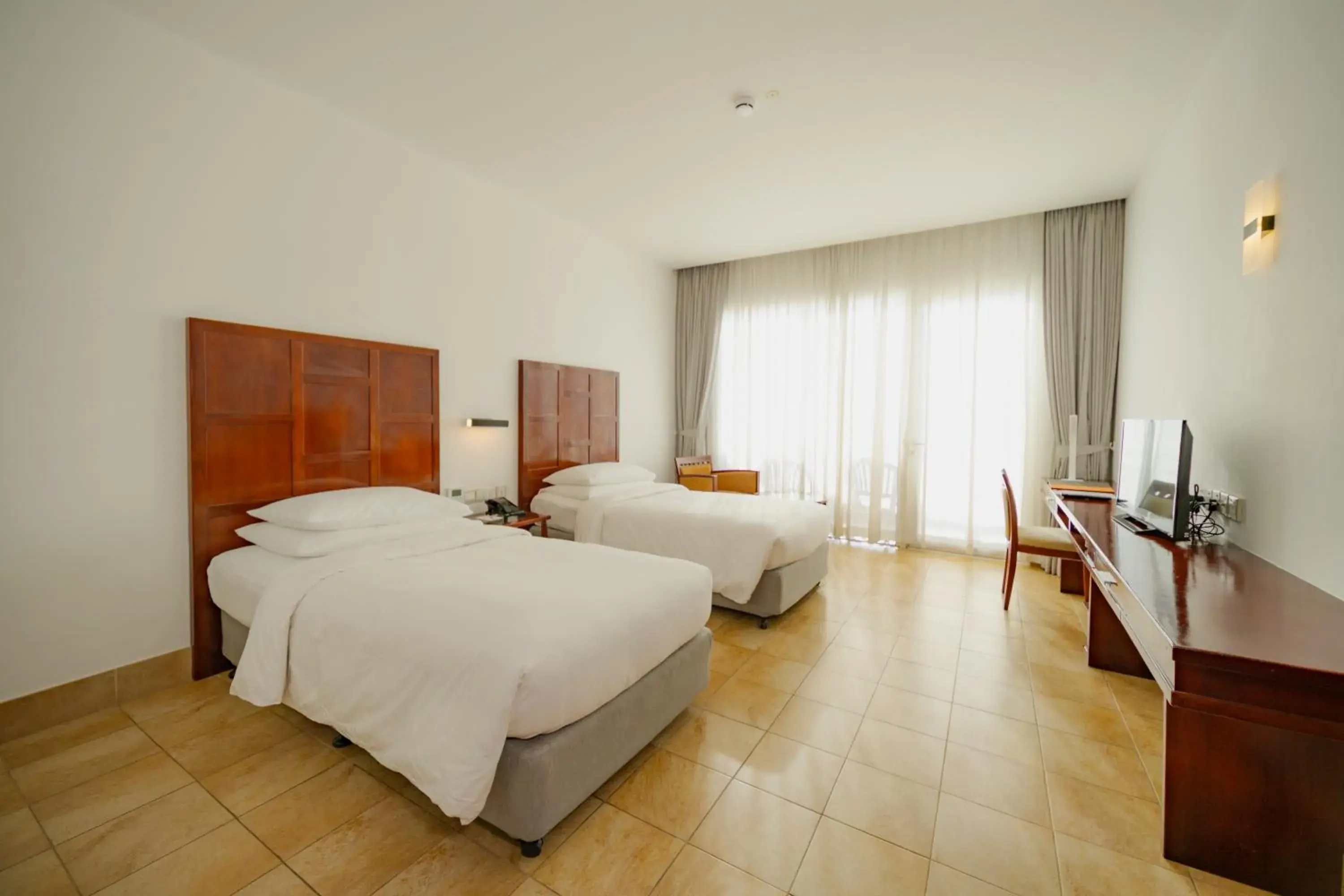 Photo of the whole room, Bed in Hulhule Island Hotel- Private Beach Access & Airport Pick-up and Drop Photo of the whole room, Bed in Hulhule Island Hotel- Private Beach Access & Airport Pick-up and Drop