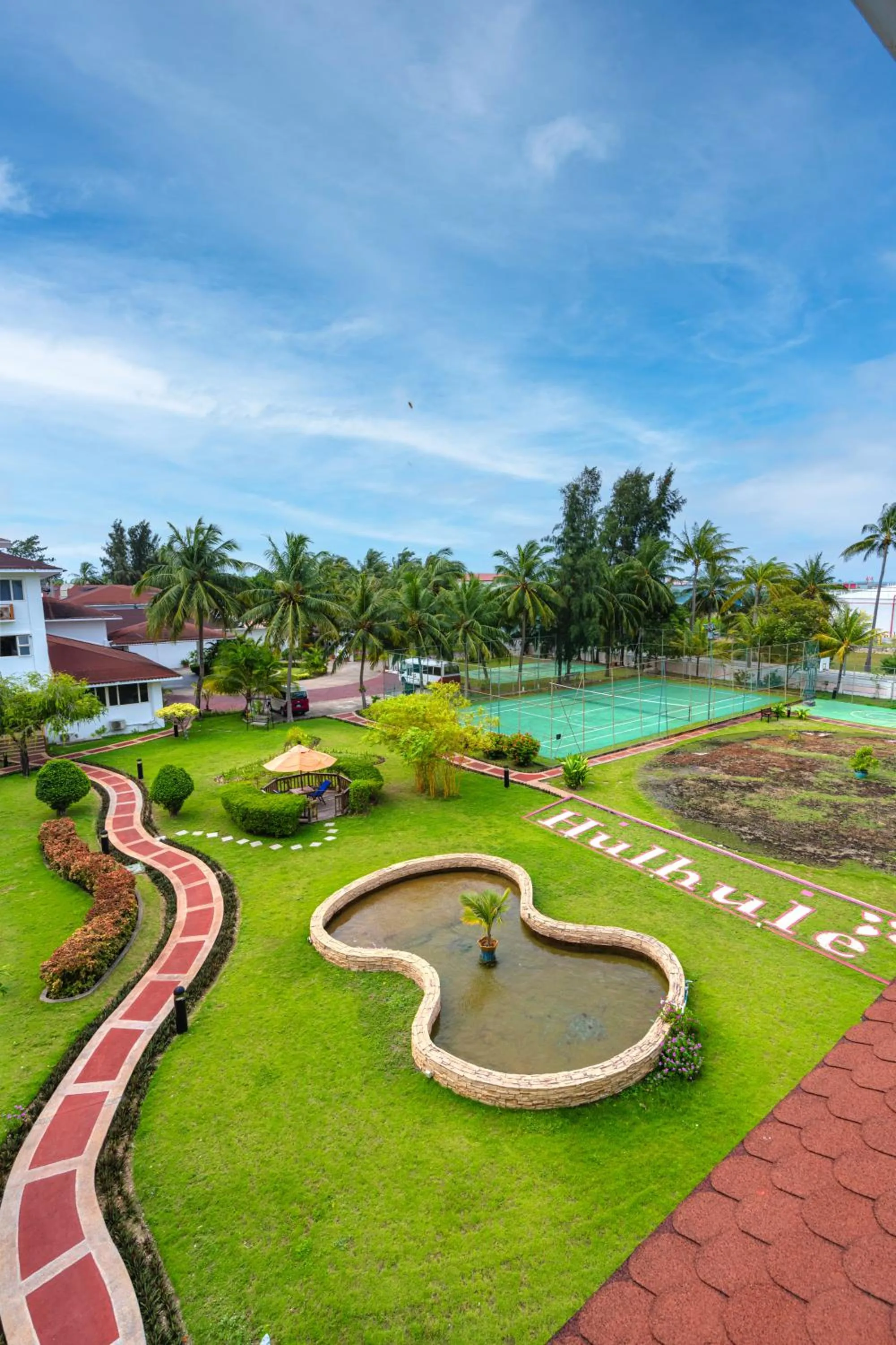 Day in Hulhule Island Hotel- Private Beach Access & Airport Pick-up and Drop