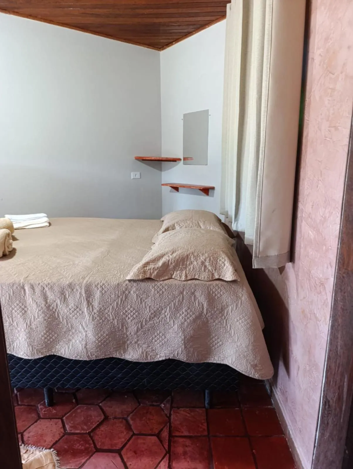 Bed in Pousada Pé do Morro