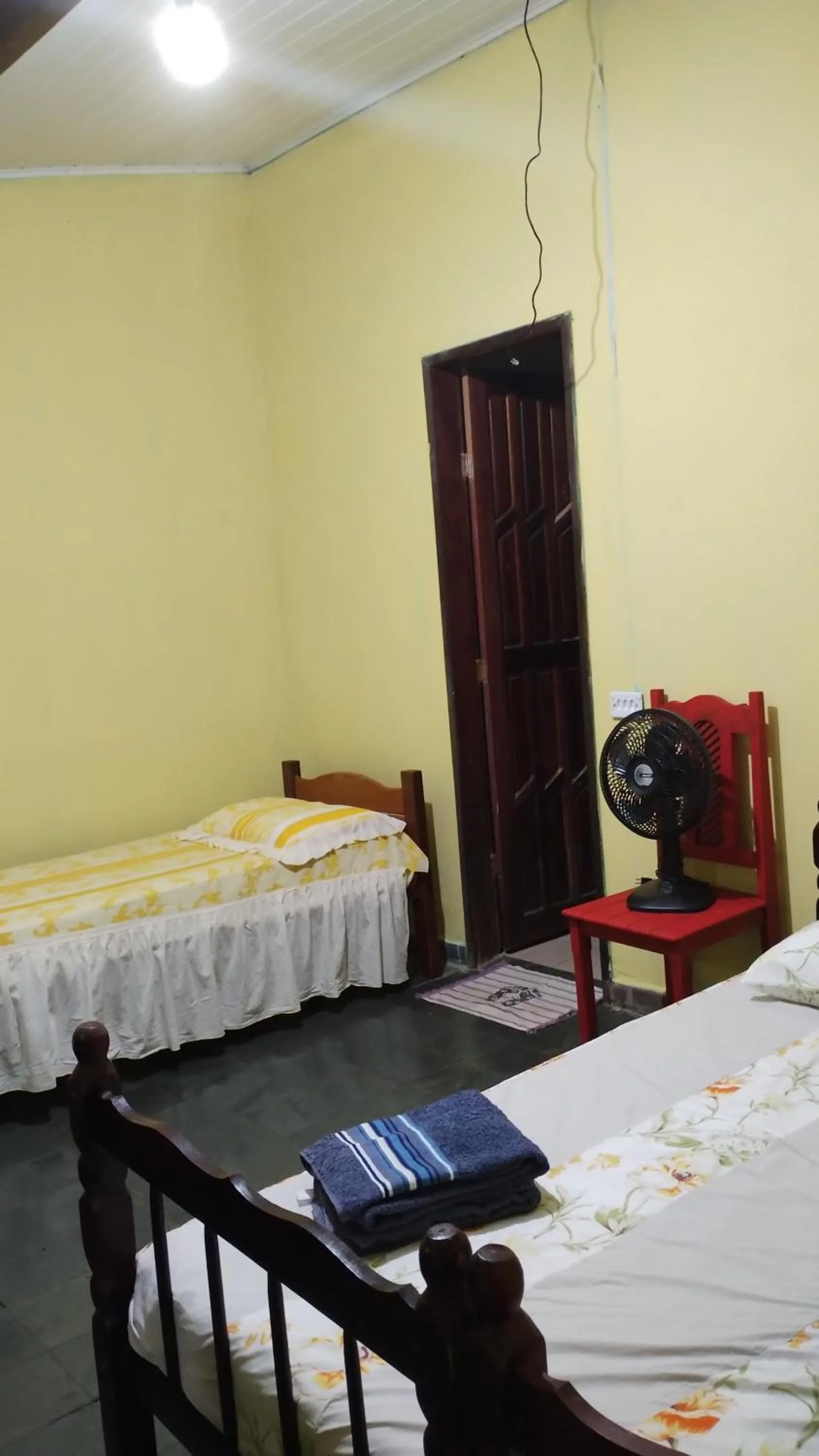 Bed in Pousada Pé do Morro