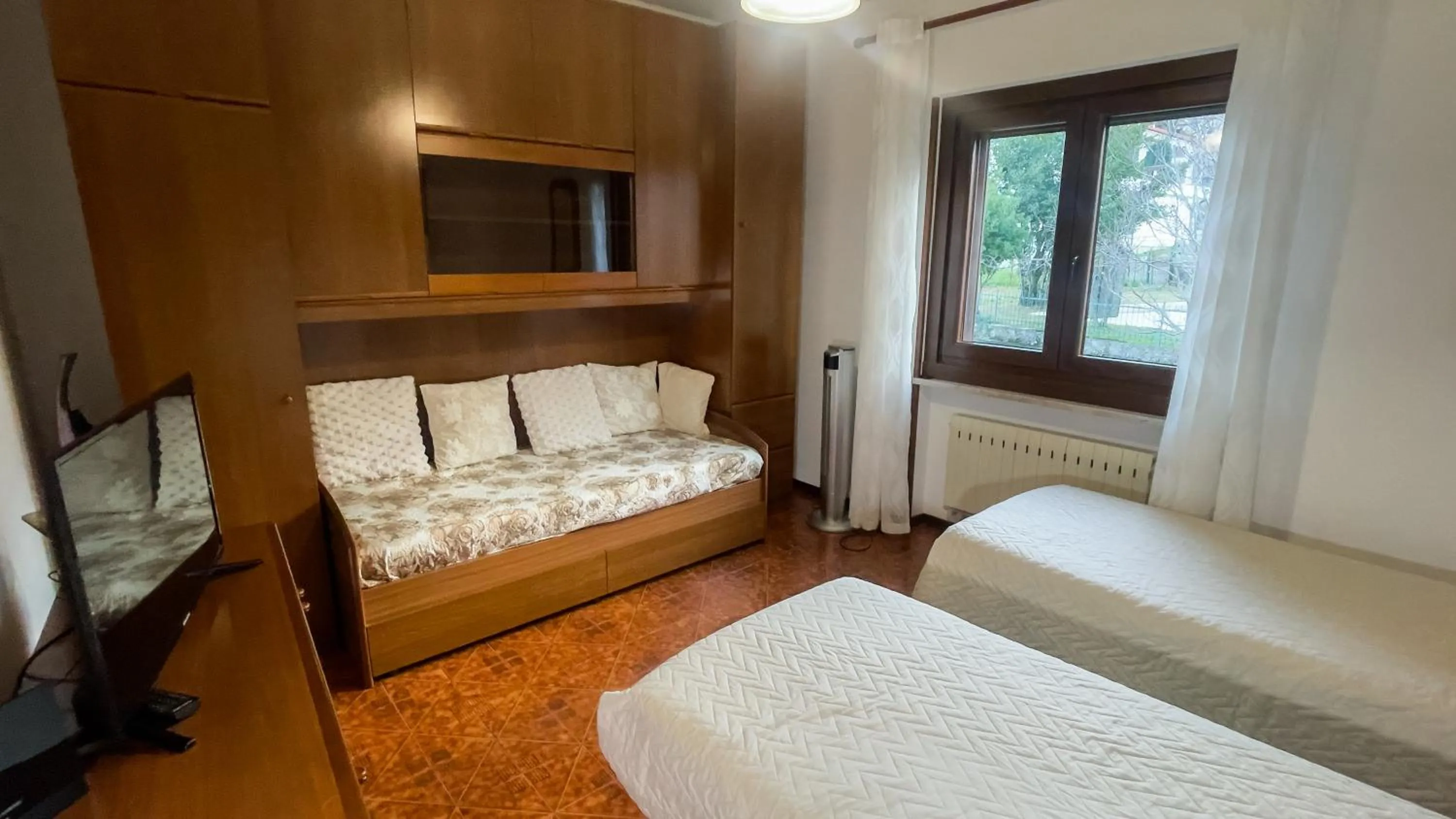 Bed in Appartamento Nerio