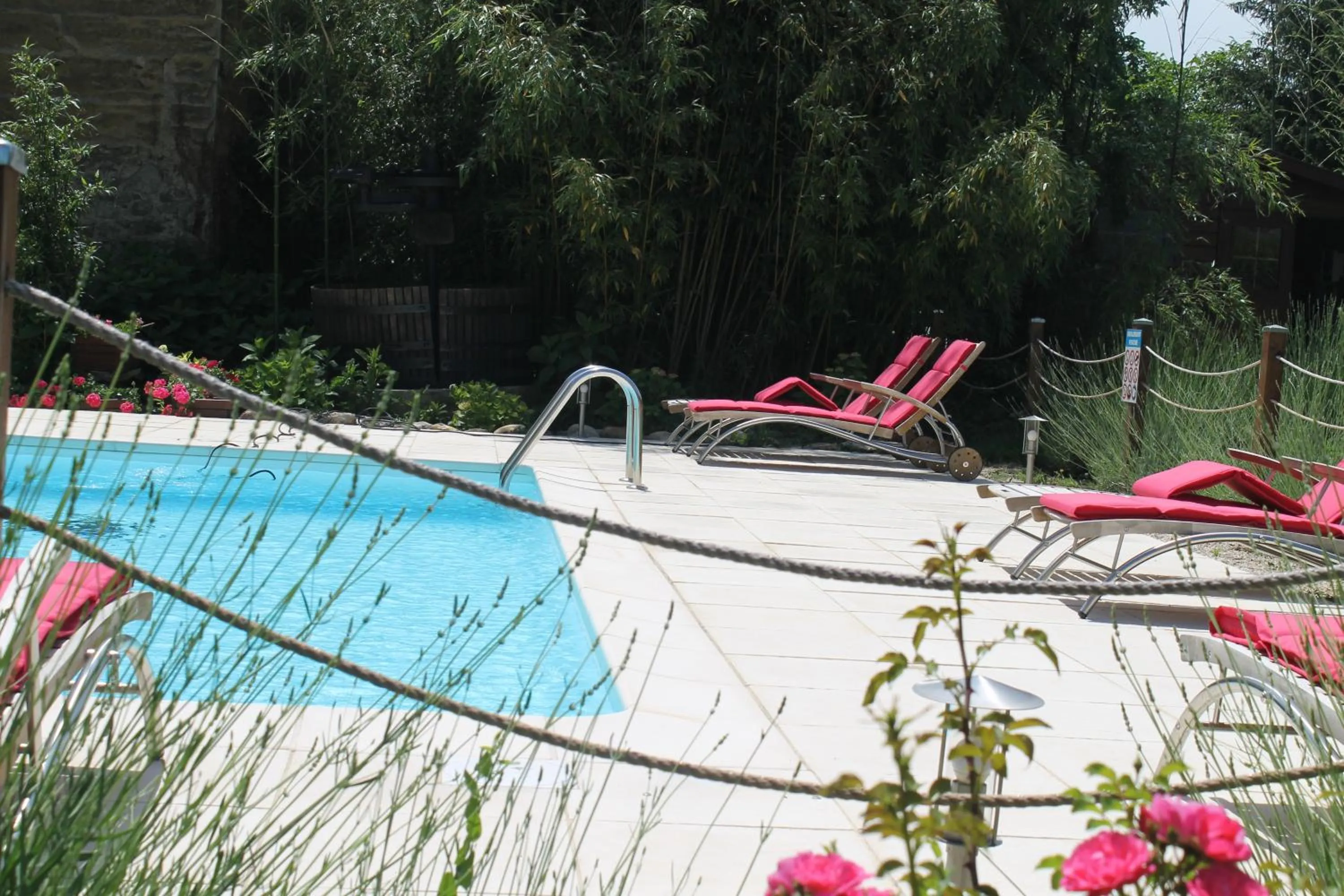 Swimming pool in Hôtel Restaurant La Désirade