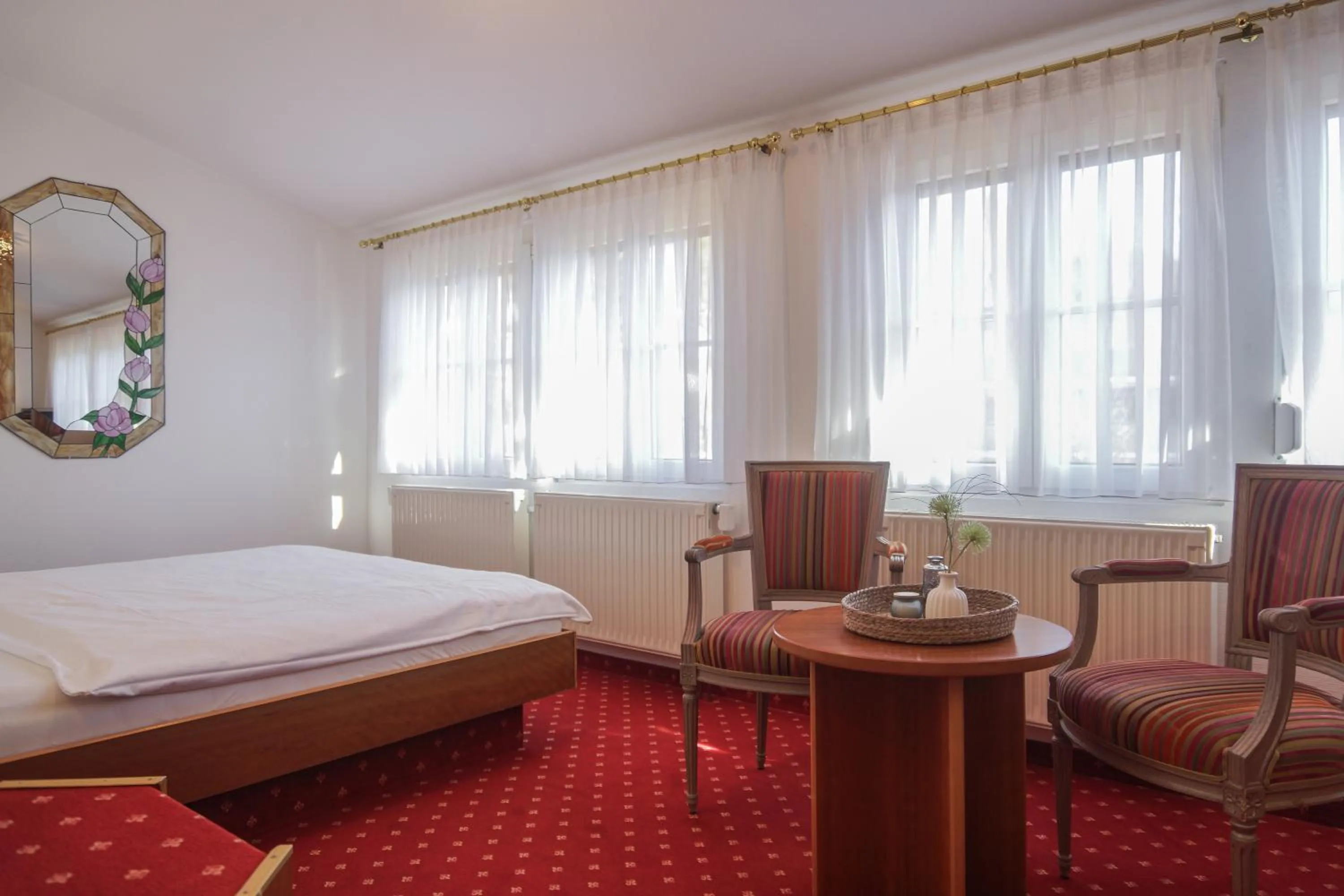 Bed in Hotel Garni in der Breite