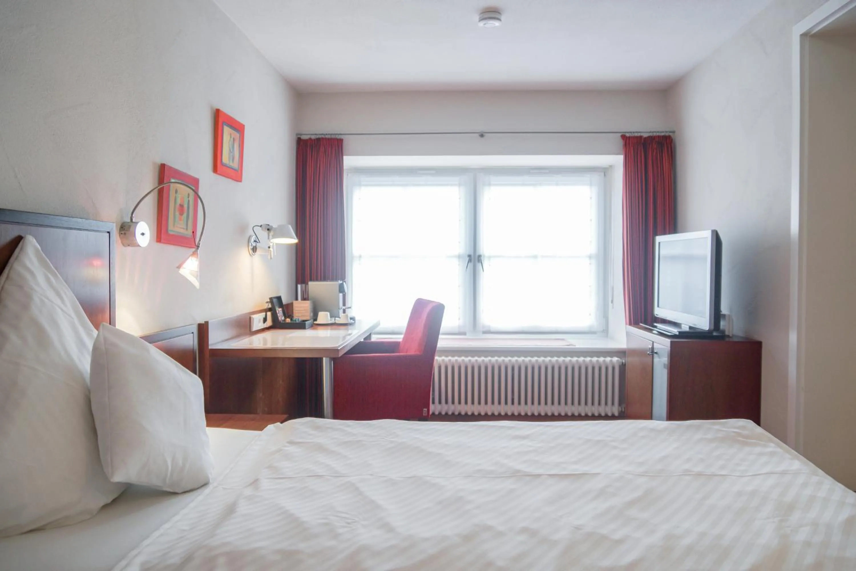 Bed in Hotel Garni in der Breite