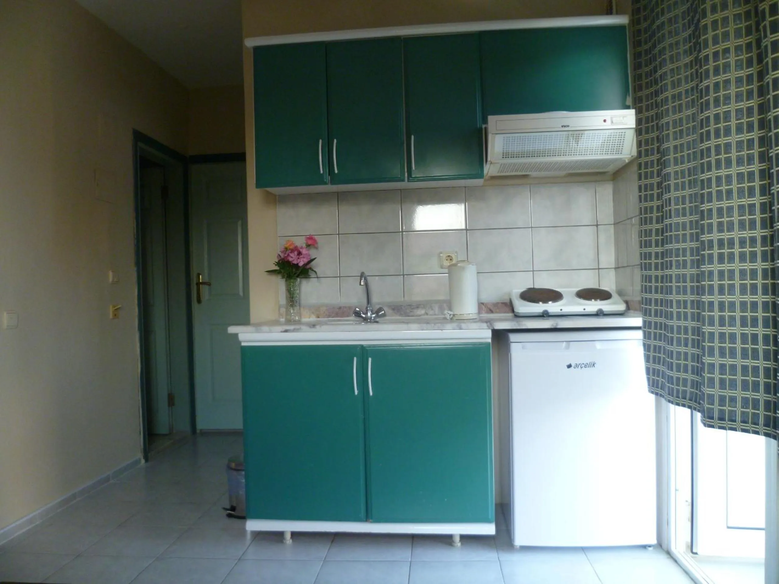 Kitchen or kitchenette in Yakut Apart Hotel