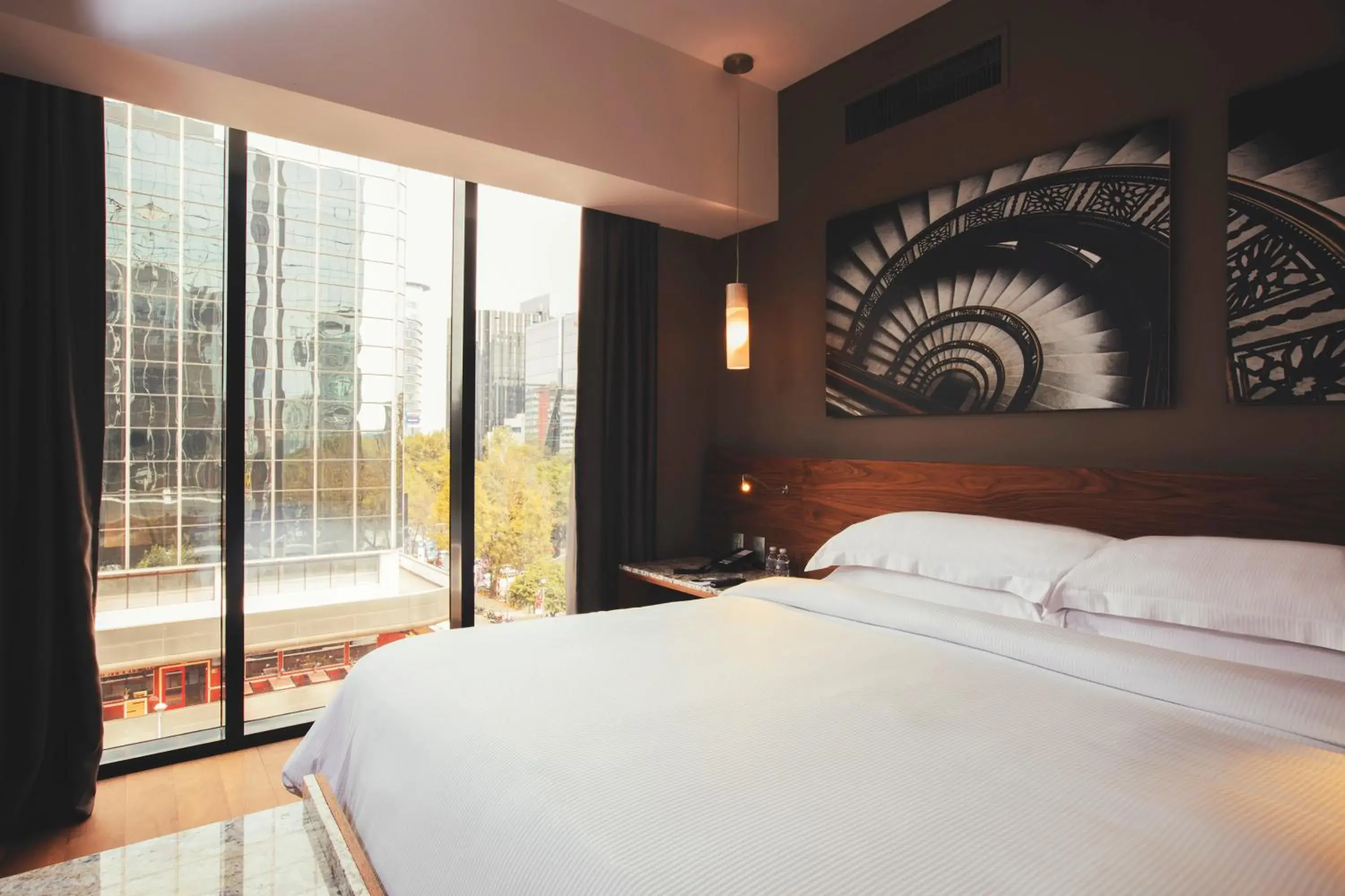 Decorative detail, Bed in Krystal Grand Suites Insurgentes Decorative detail, Bed in Krystal Grand Suites Insurgentes