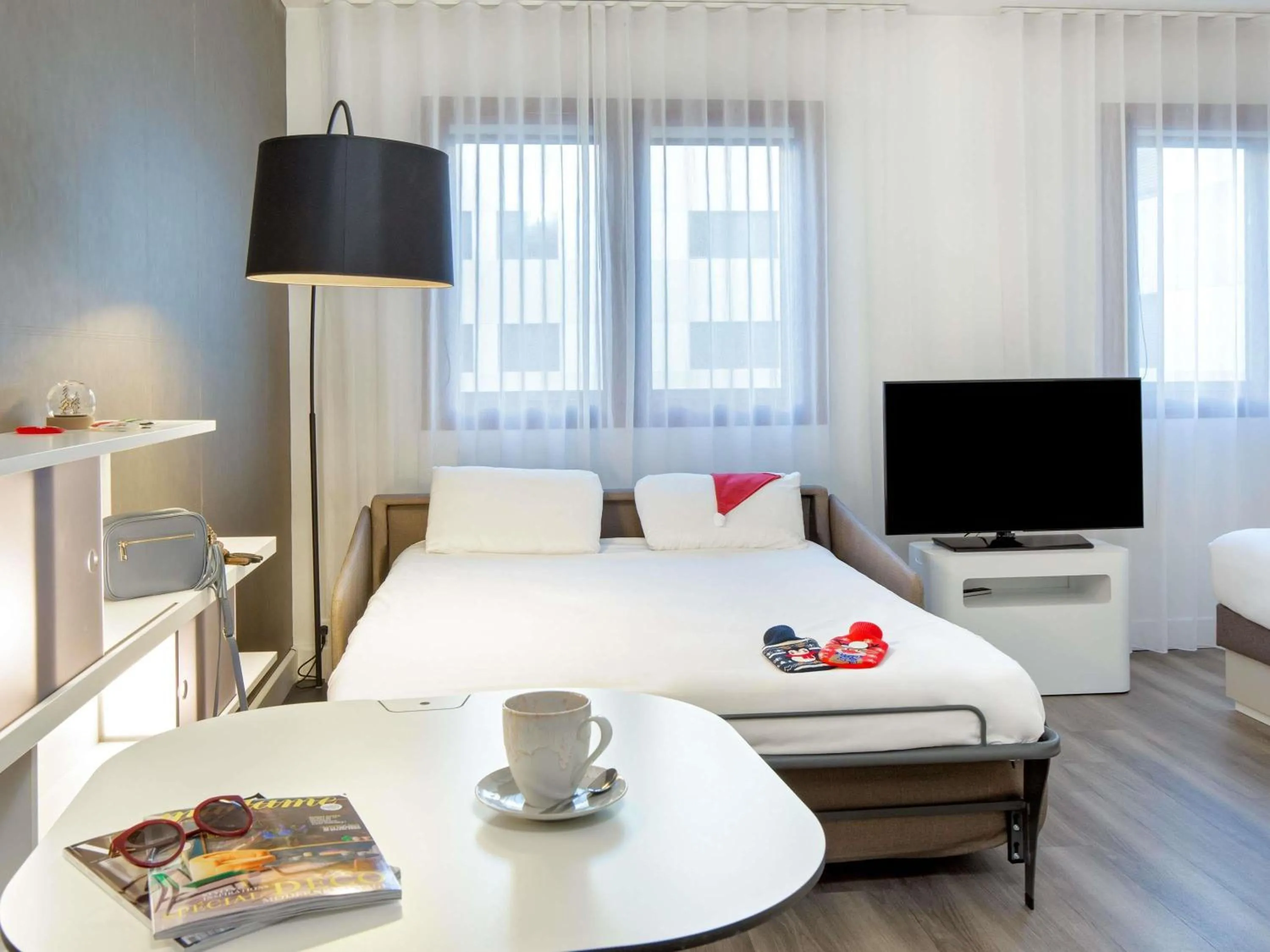 Bedroom, Bed in Novotel Suites Perpignan Centre - Grandes Suites & Confort Centre-Ville