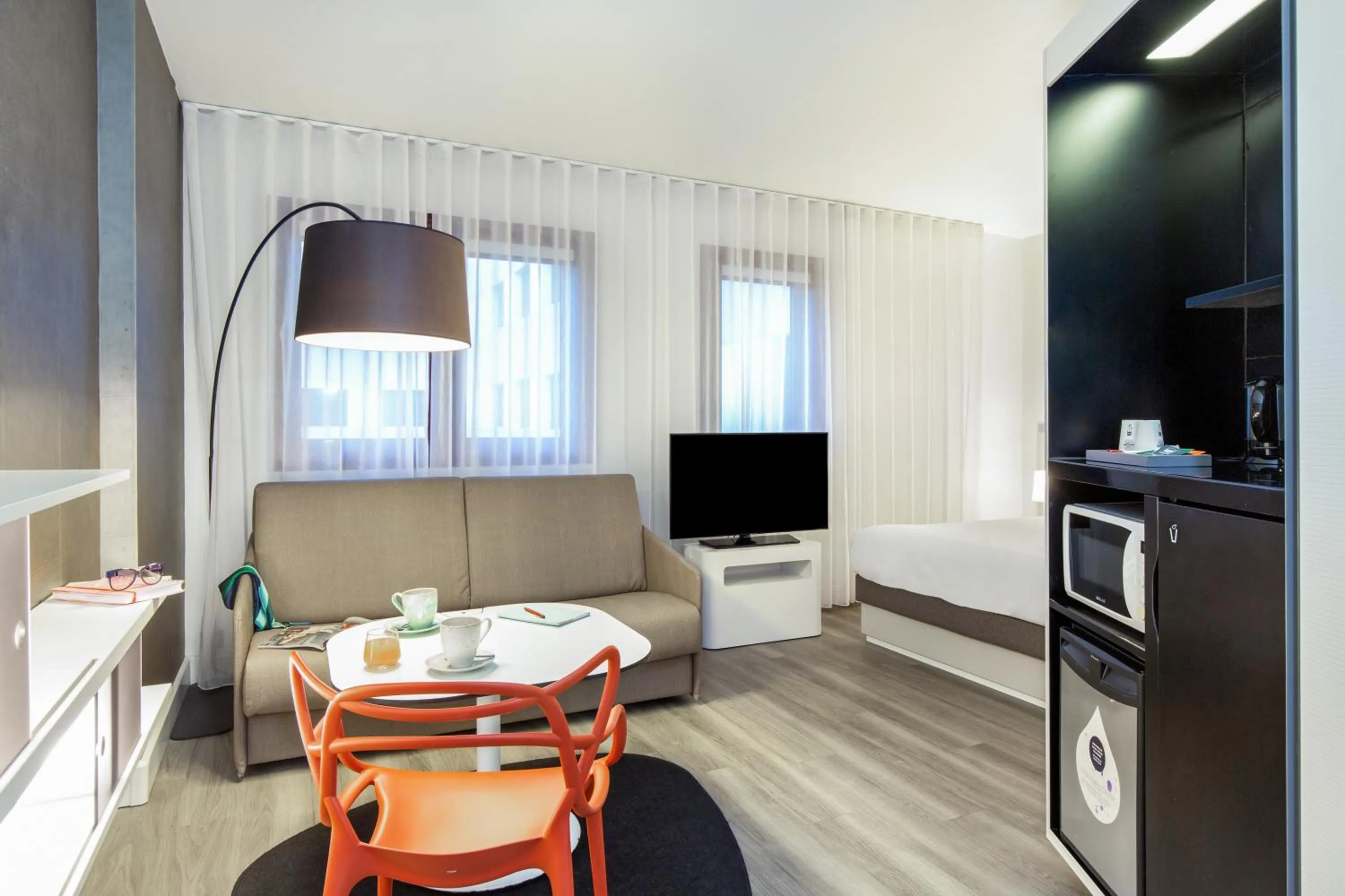Living room in Novotel Suites Perpignan Centre - Grandes Suites & Confort Centre-Ville