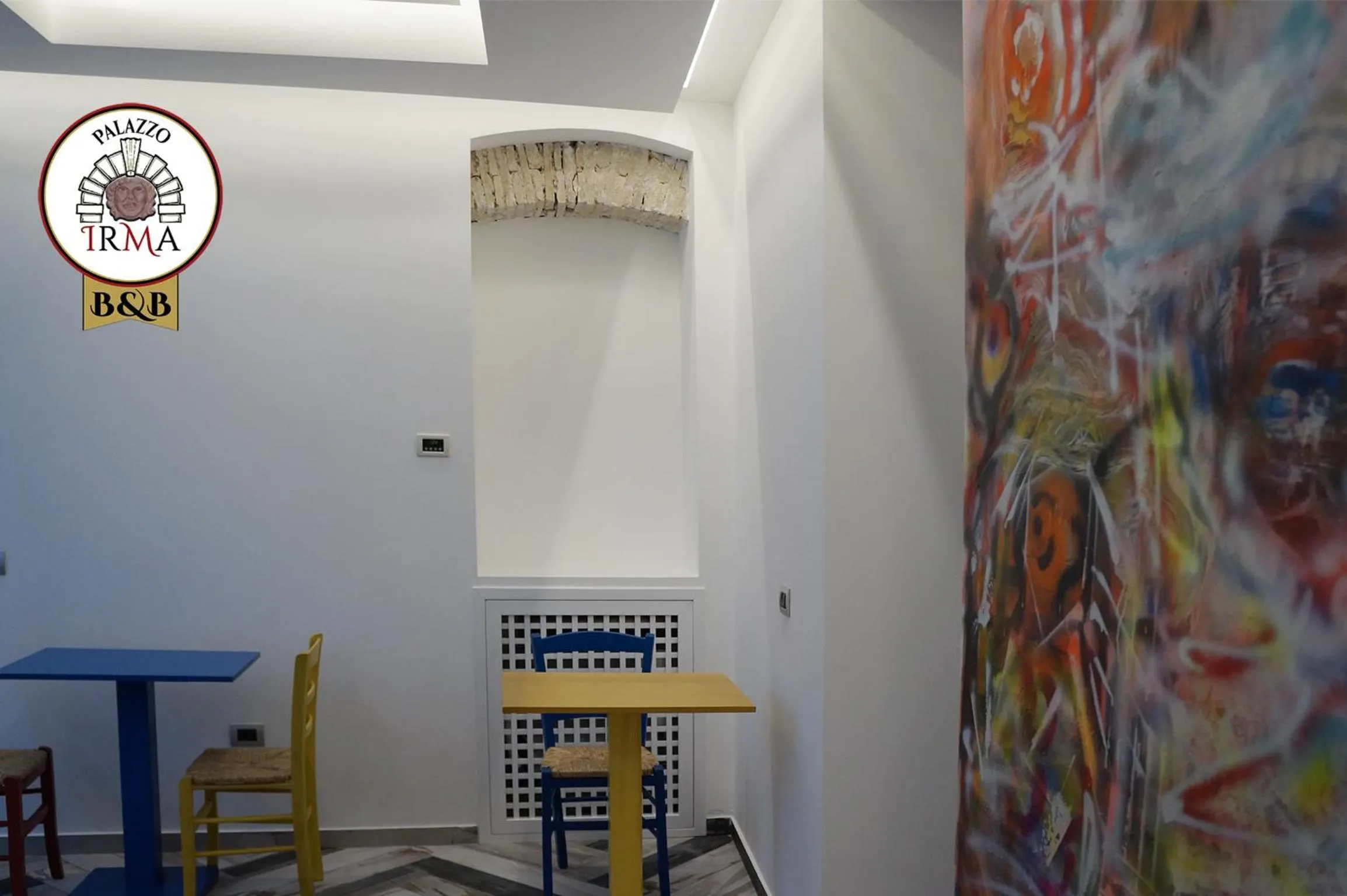 Communal lounge/ TV room in Palazzo IrMa - Hotel - B&B Luxury