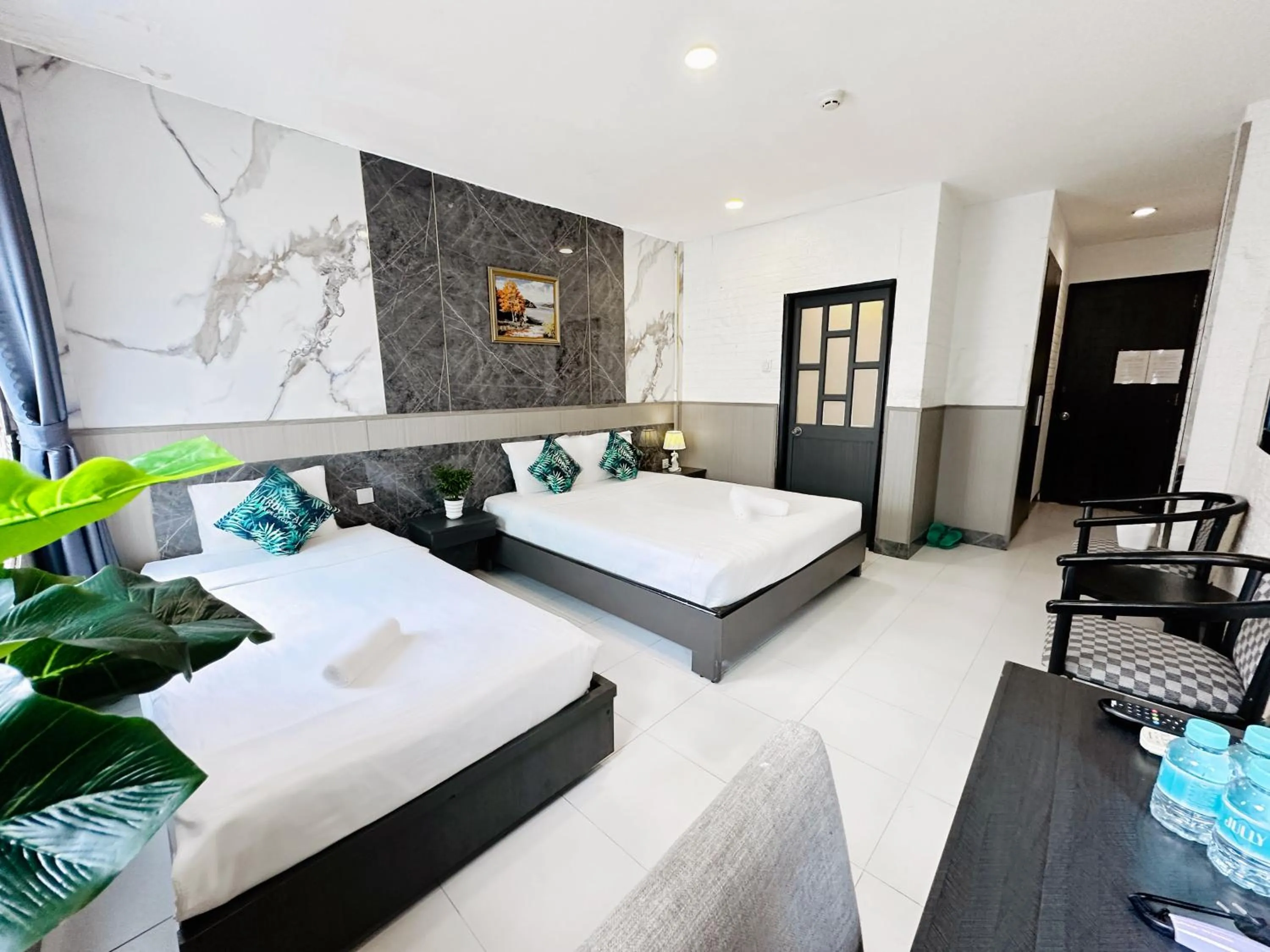 Photo of the whole room, Bed in Centana Ben Thanh Hotel