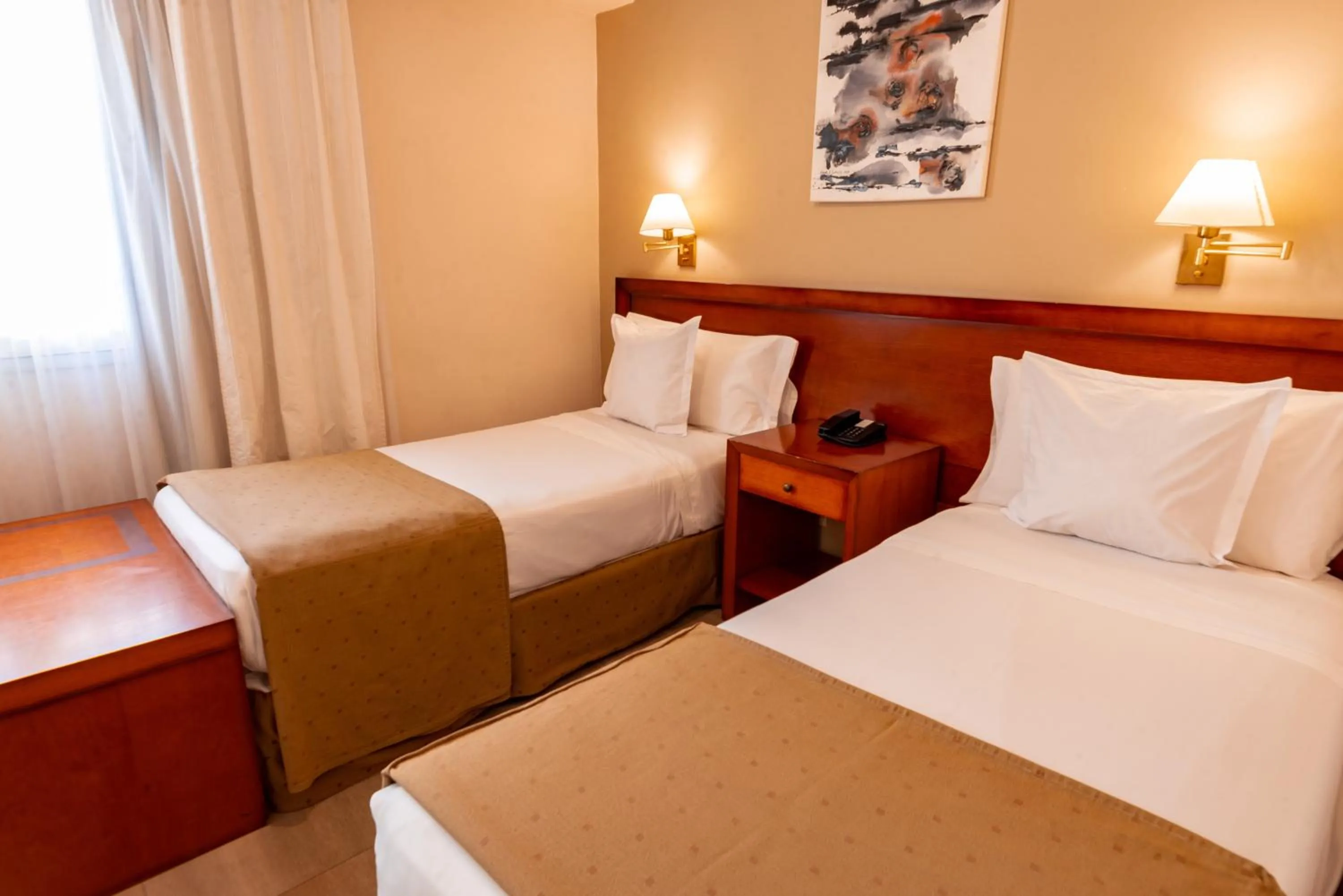 Bed in Hotel Riviera