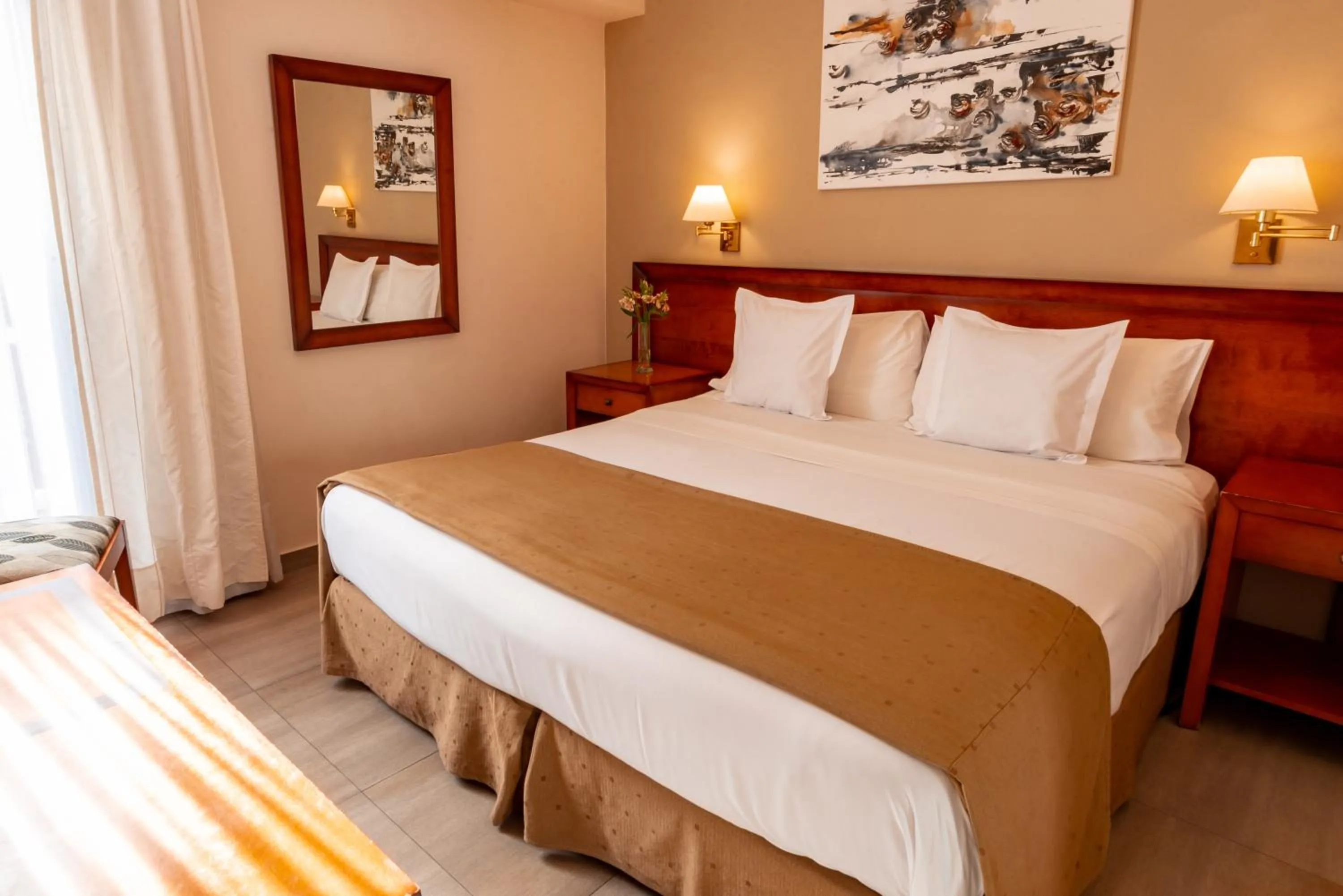 Bed in Hotel Riviera