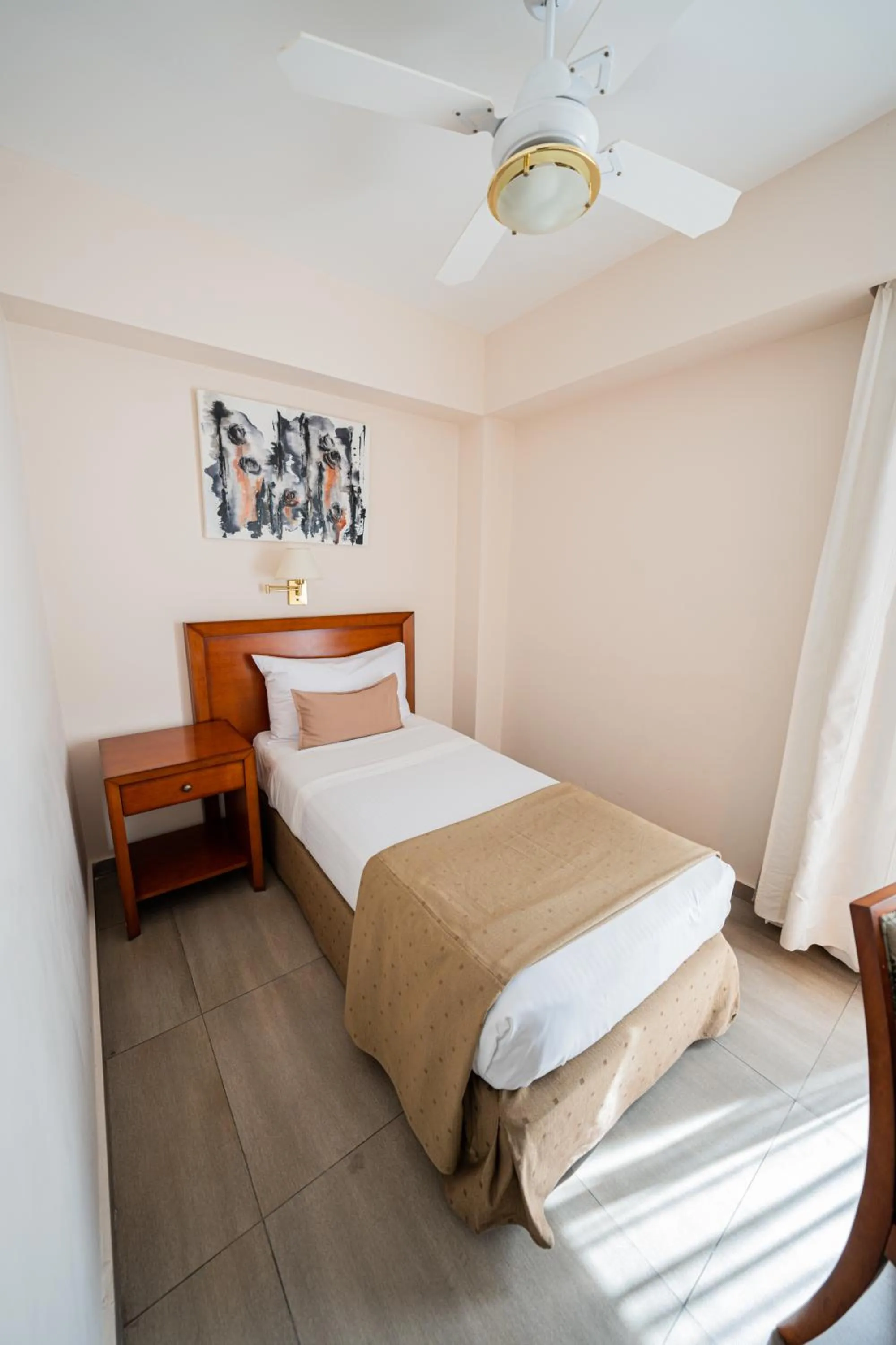 Bed in Hotel Riviera