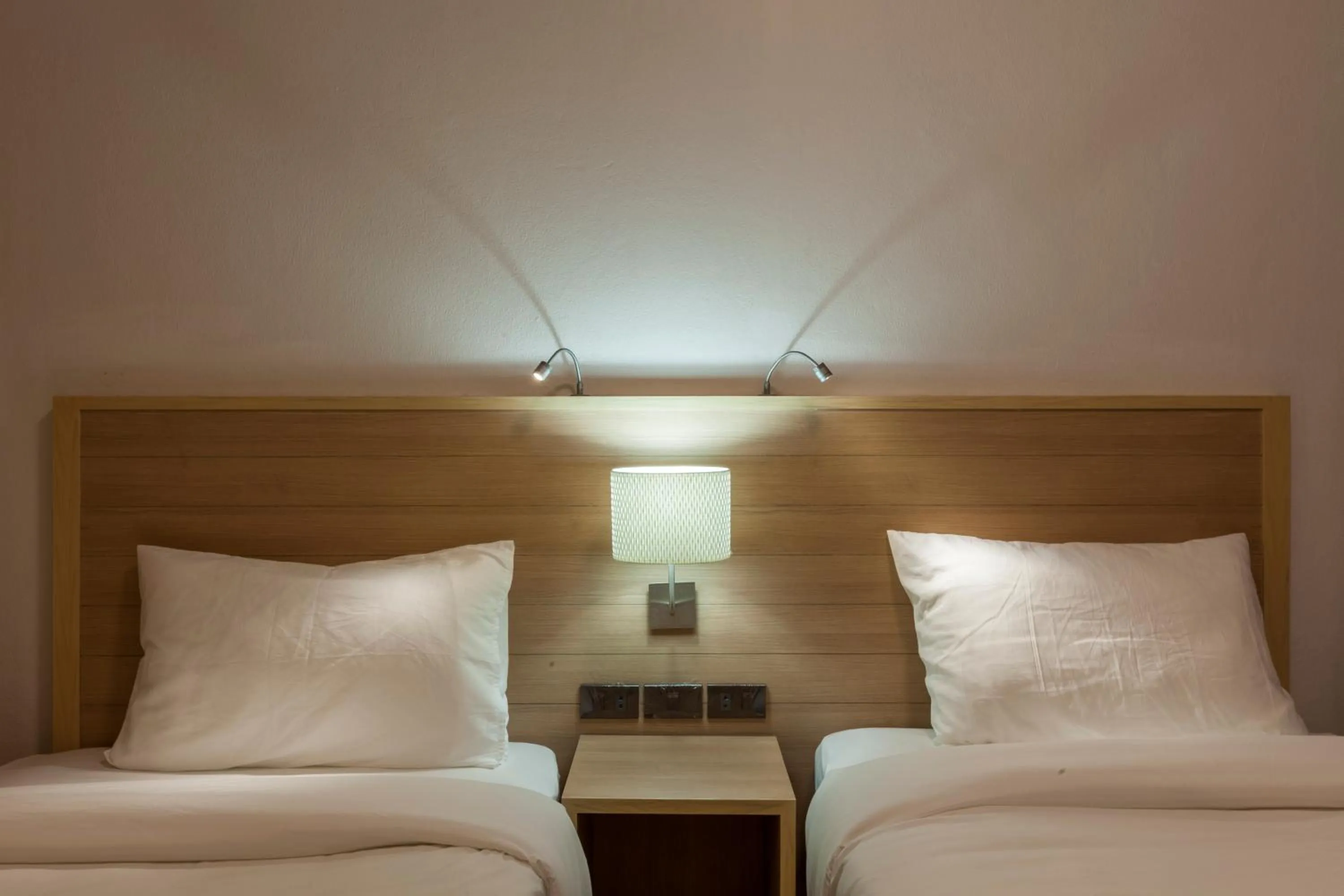 Bed in RCN Court & Inn