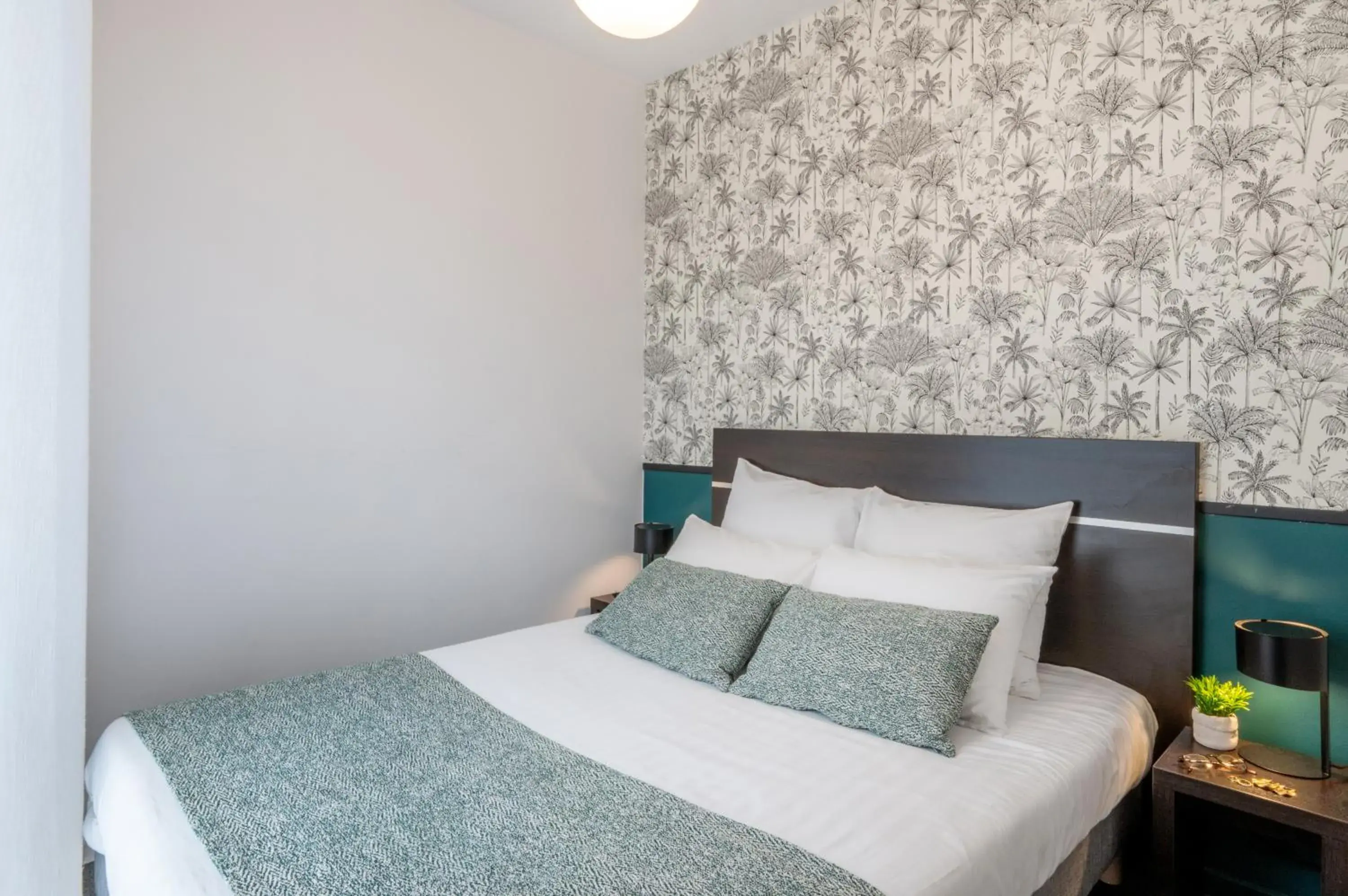 Bedroom, Bed in Nemea Appart Hotel Home Suite Nancy Centre Bedroom, Bed in Nemea Appart Hotel Home Suite Nancy Centre