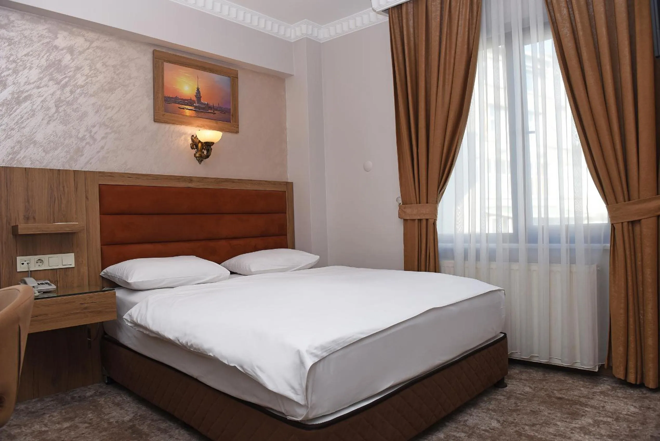 Bed in Hotel Grand Umit