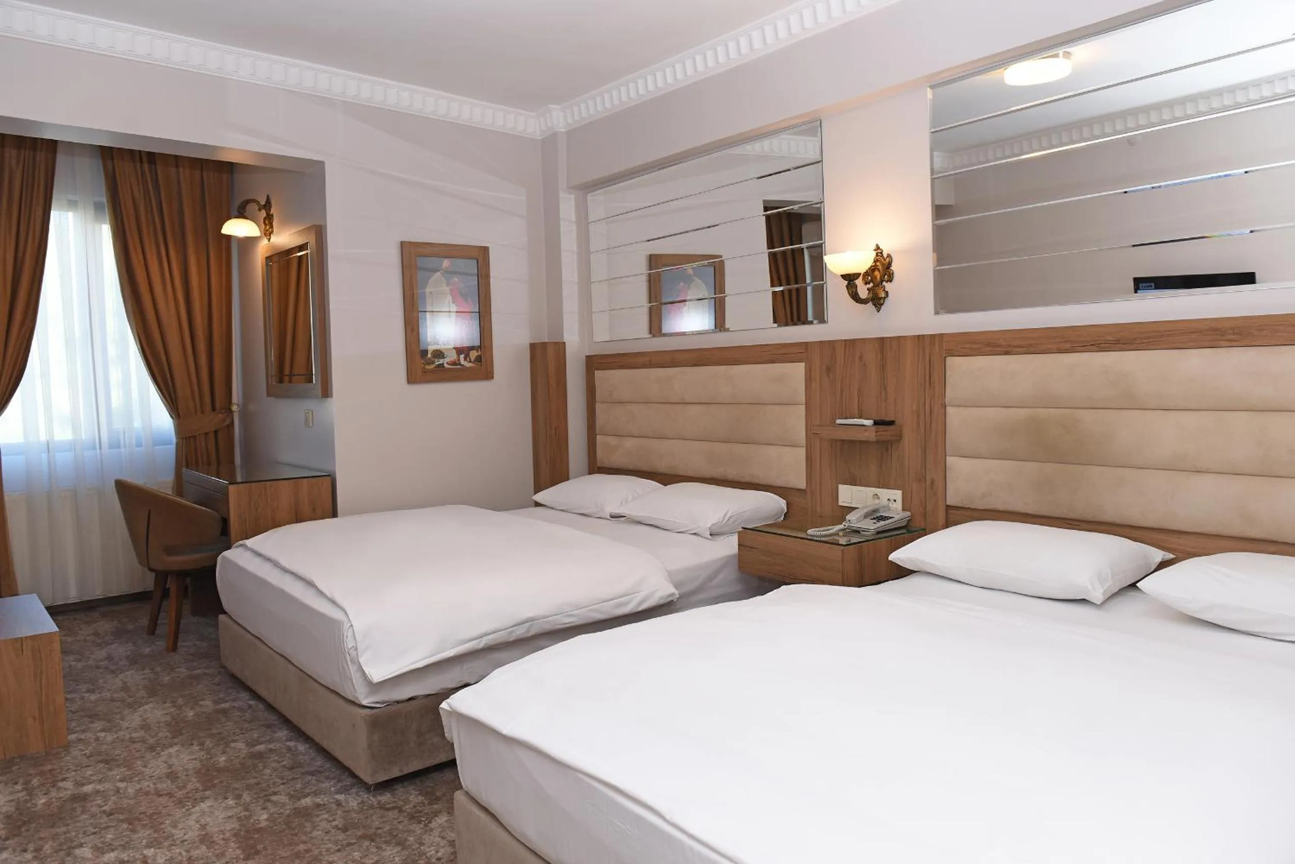 Bed in Hotel Grand Umit