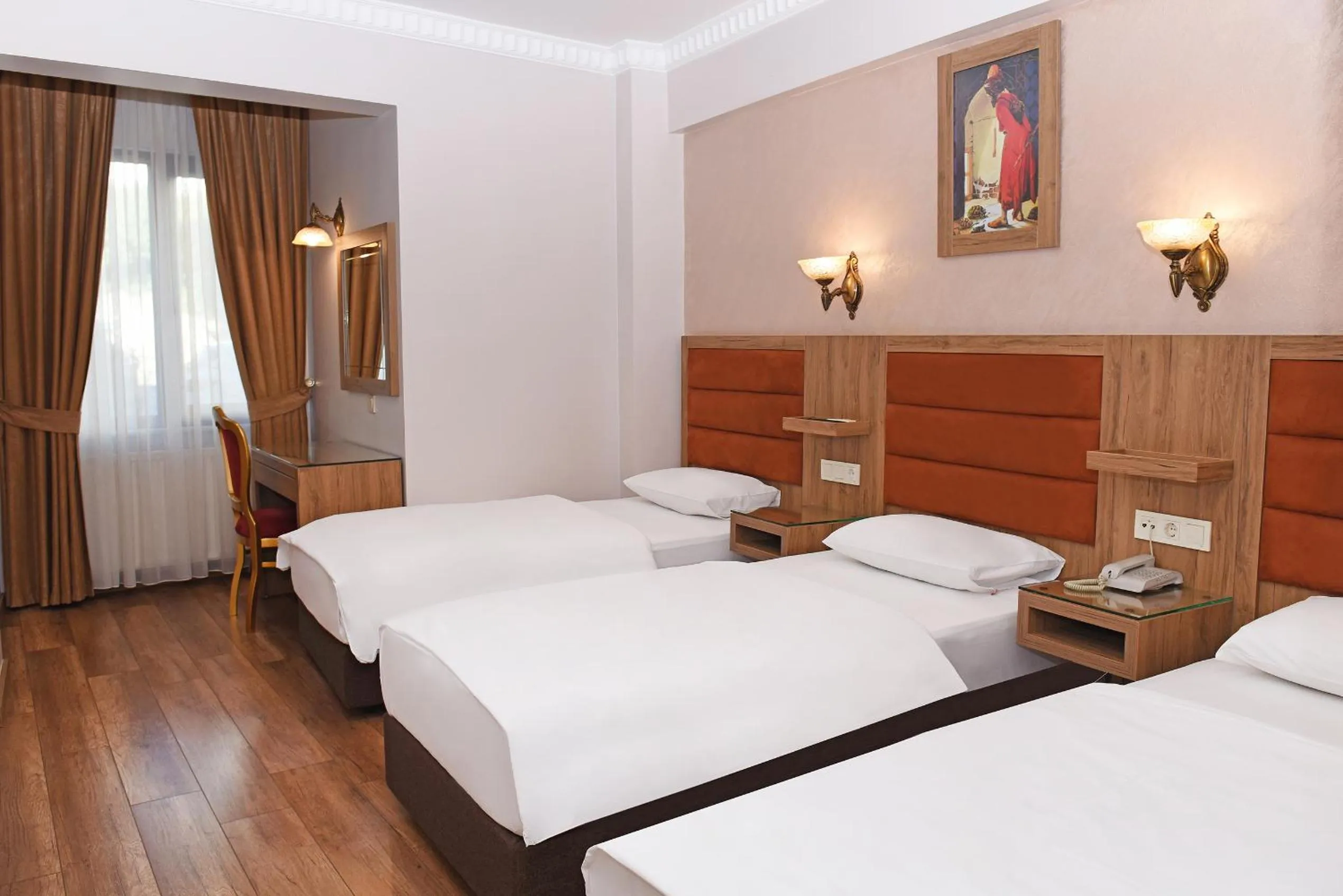 Bed in Hotel Grand Umit