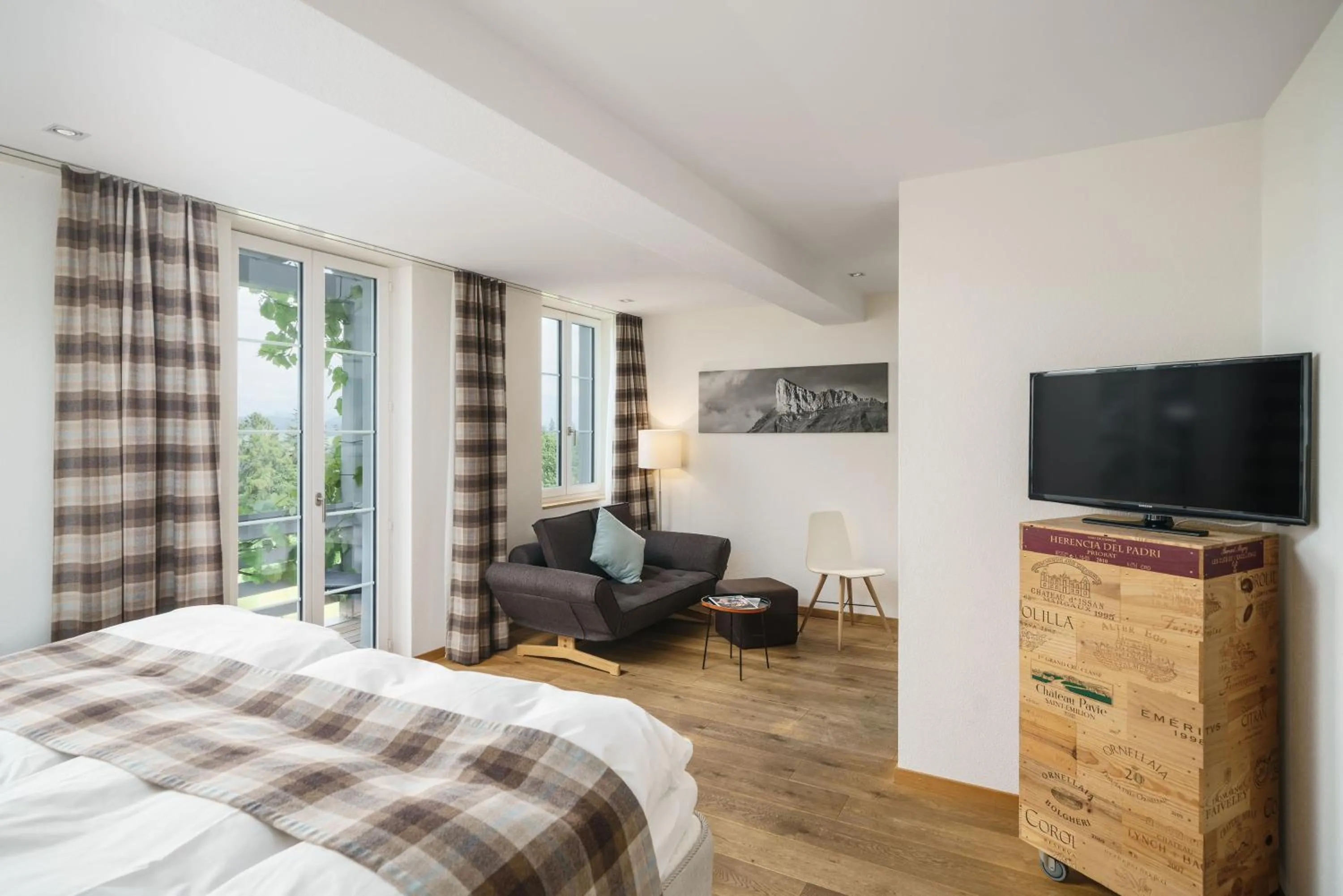 Living room, Bed in Boutique Hotel Moosegg