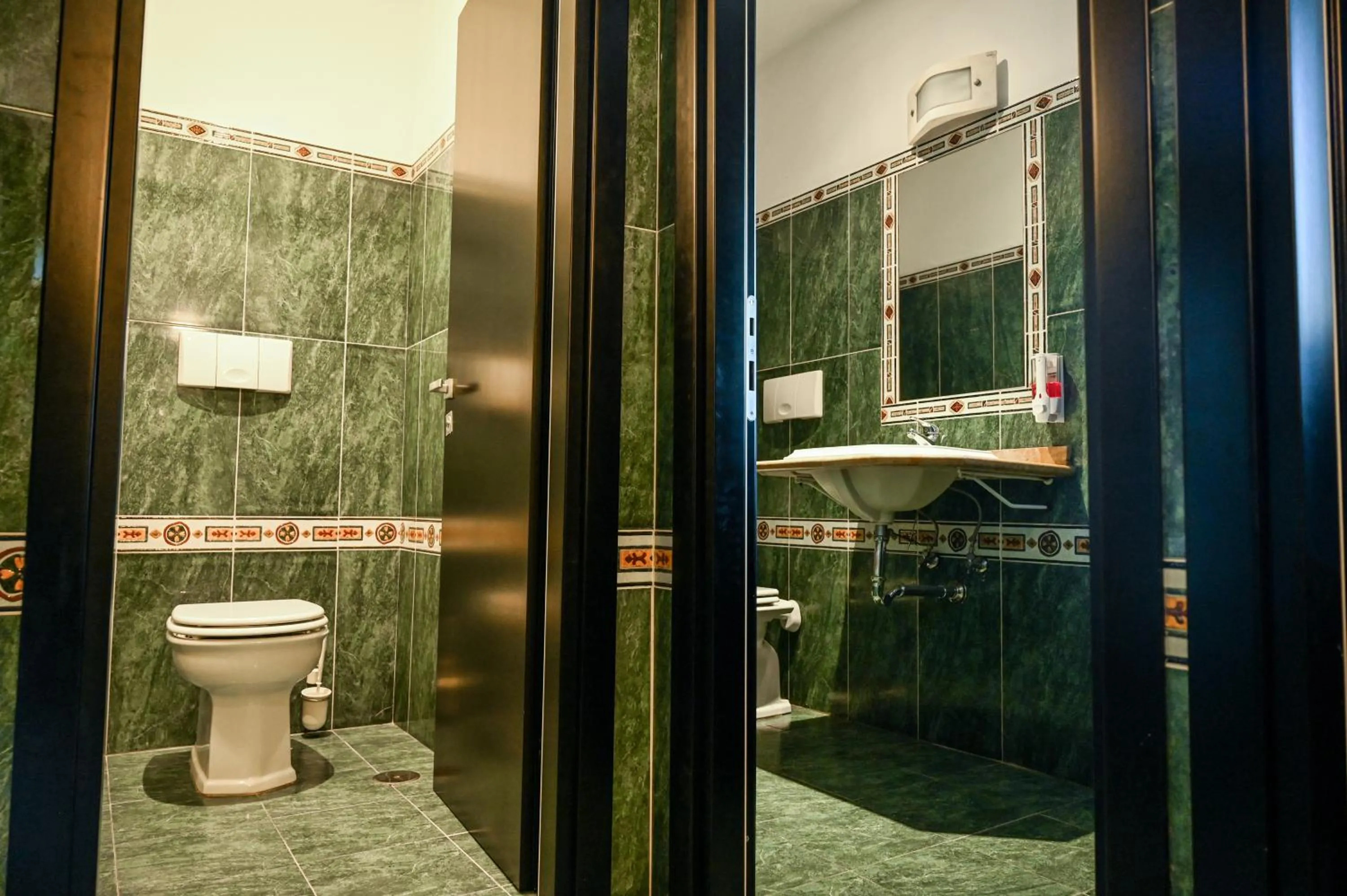 Bathroom in Roma Domus Hotel