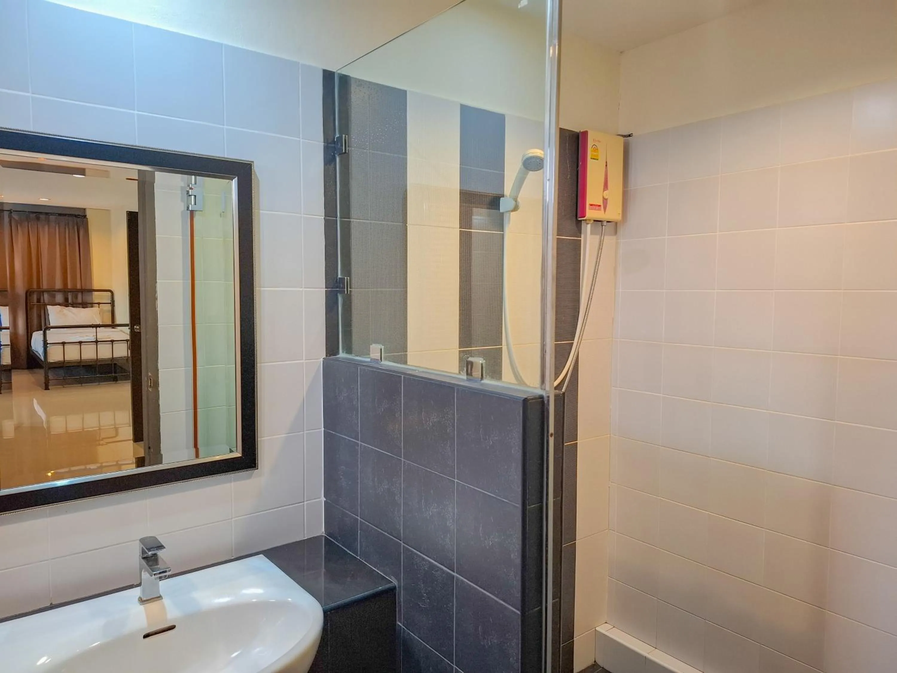 Shower in The Hideaway Resort Pattaya