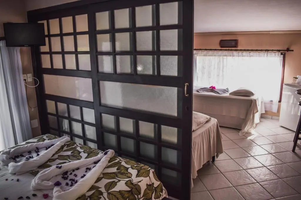 Bed in Pousada Recanto da Coruja