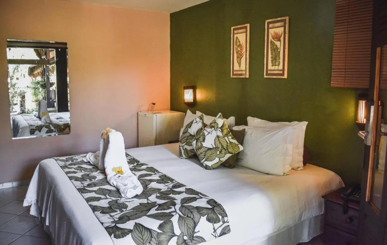 Bed in Pousada Recanto da Coruja