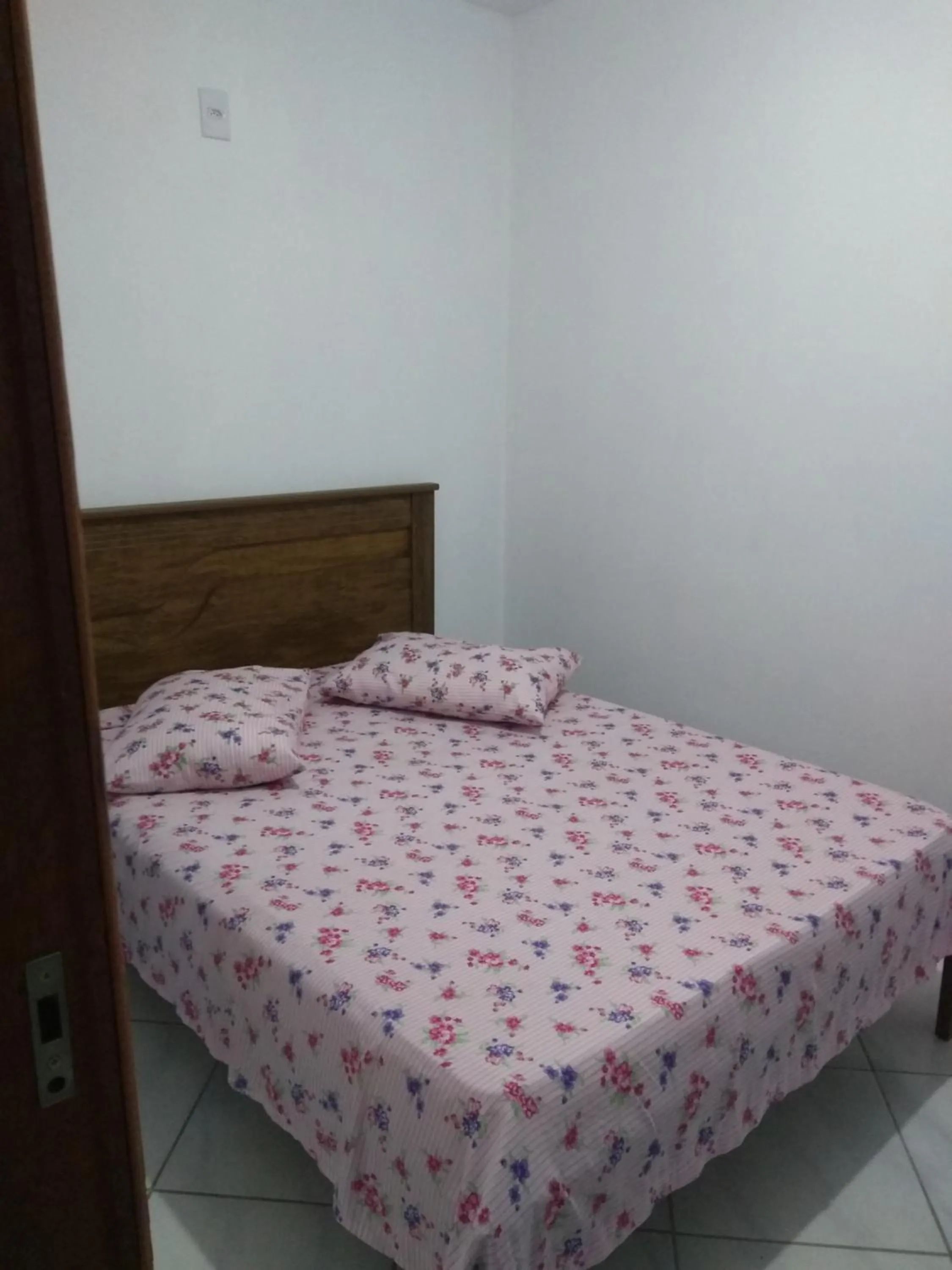 Bed in Pousada Pingo de Ouro