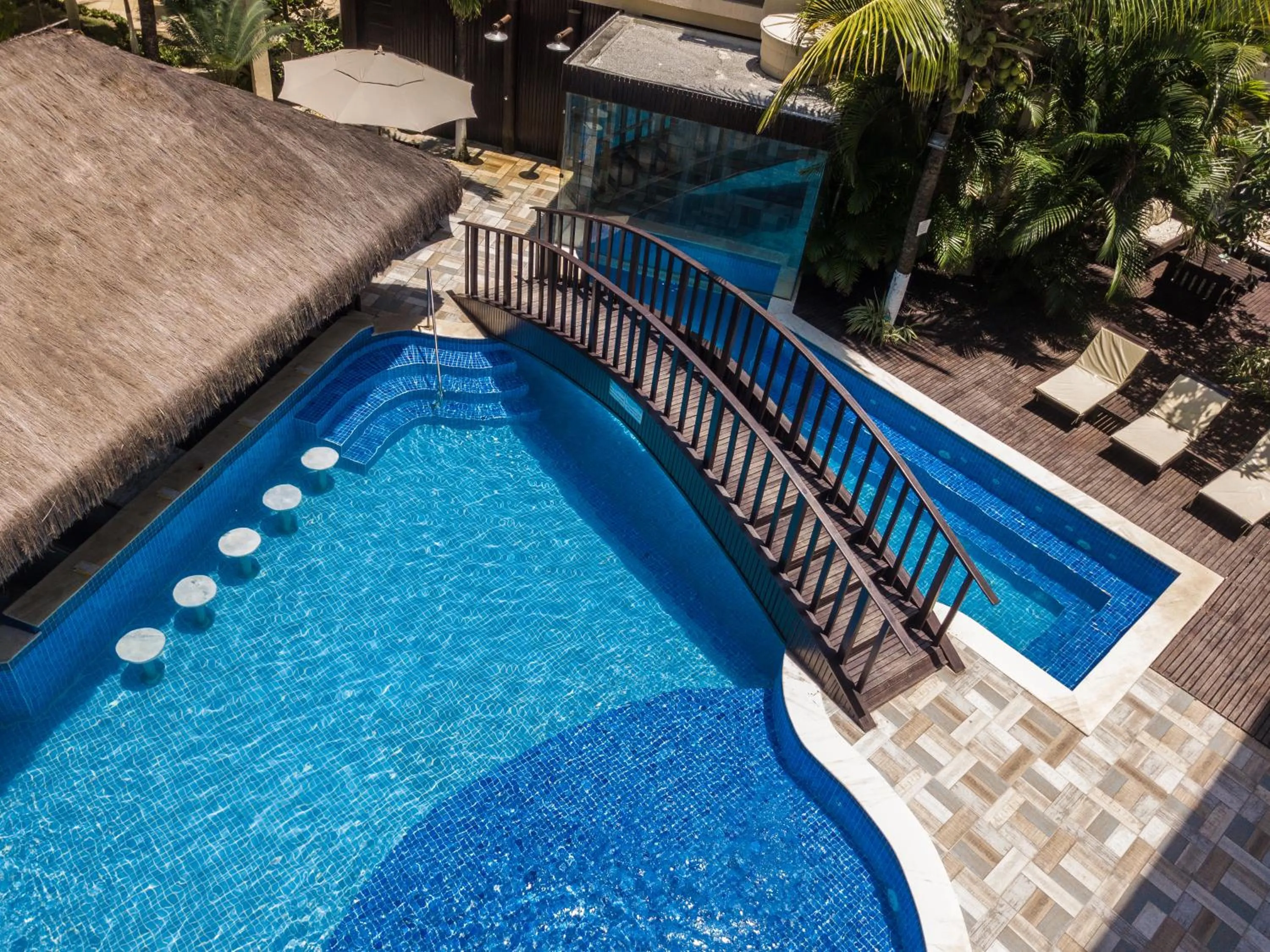 Swimming pool in Pousada Recanto do Lobo