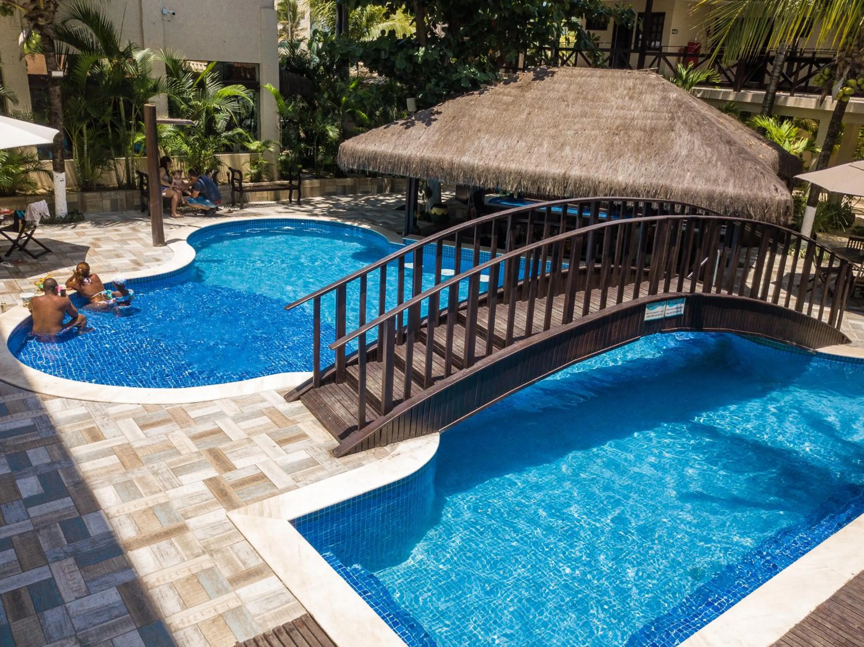 Swimming pool in Pousada Recanto do Lobo