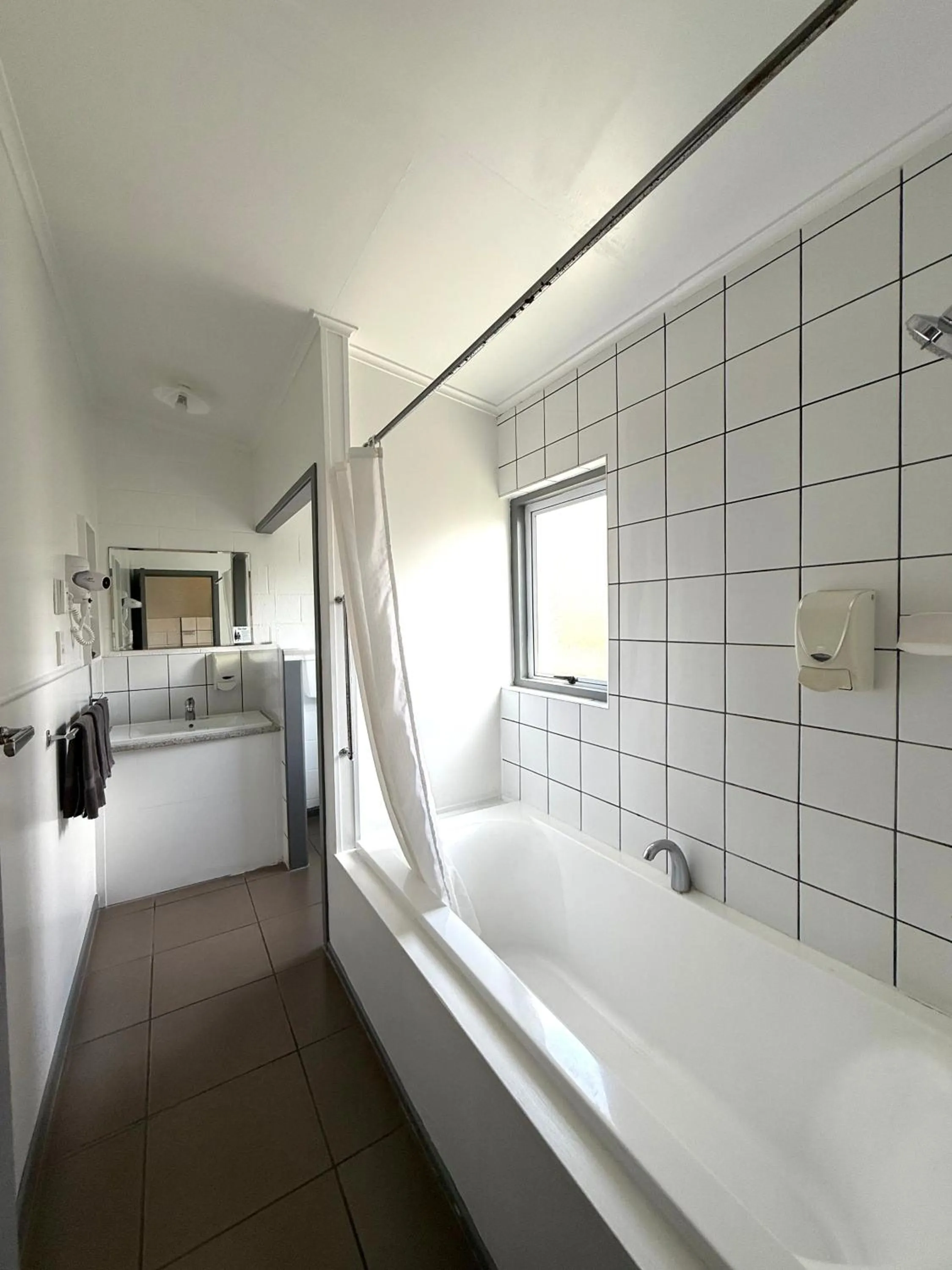 Bathroom in Central Court Motel