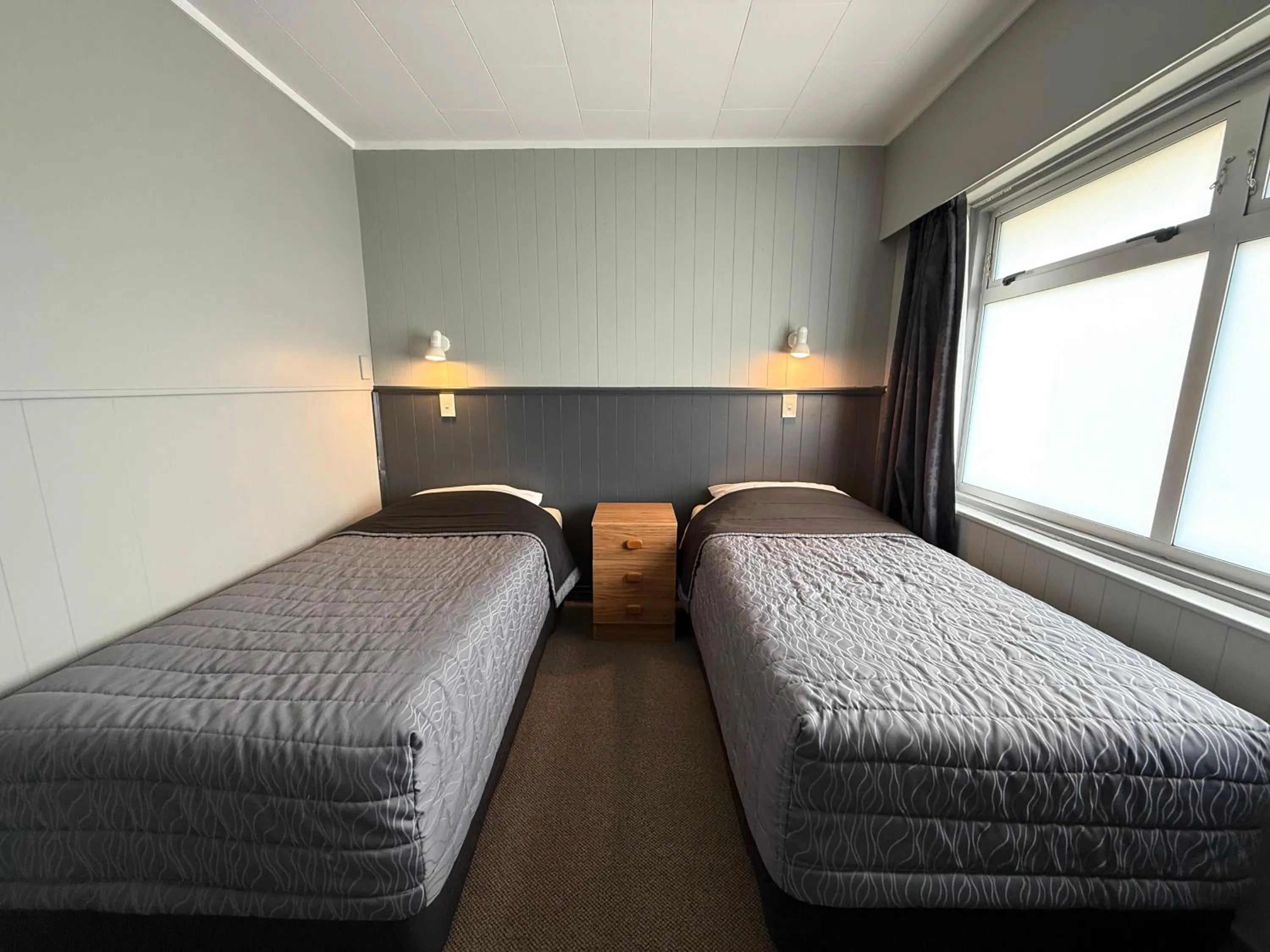 Bed in Central Court Motel