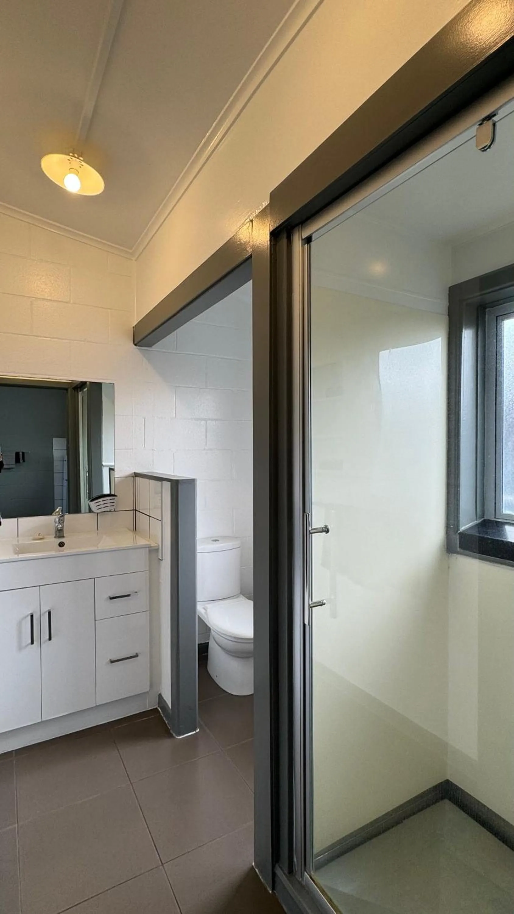 Shower in Central Court Motel