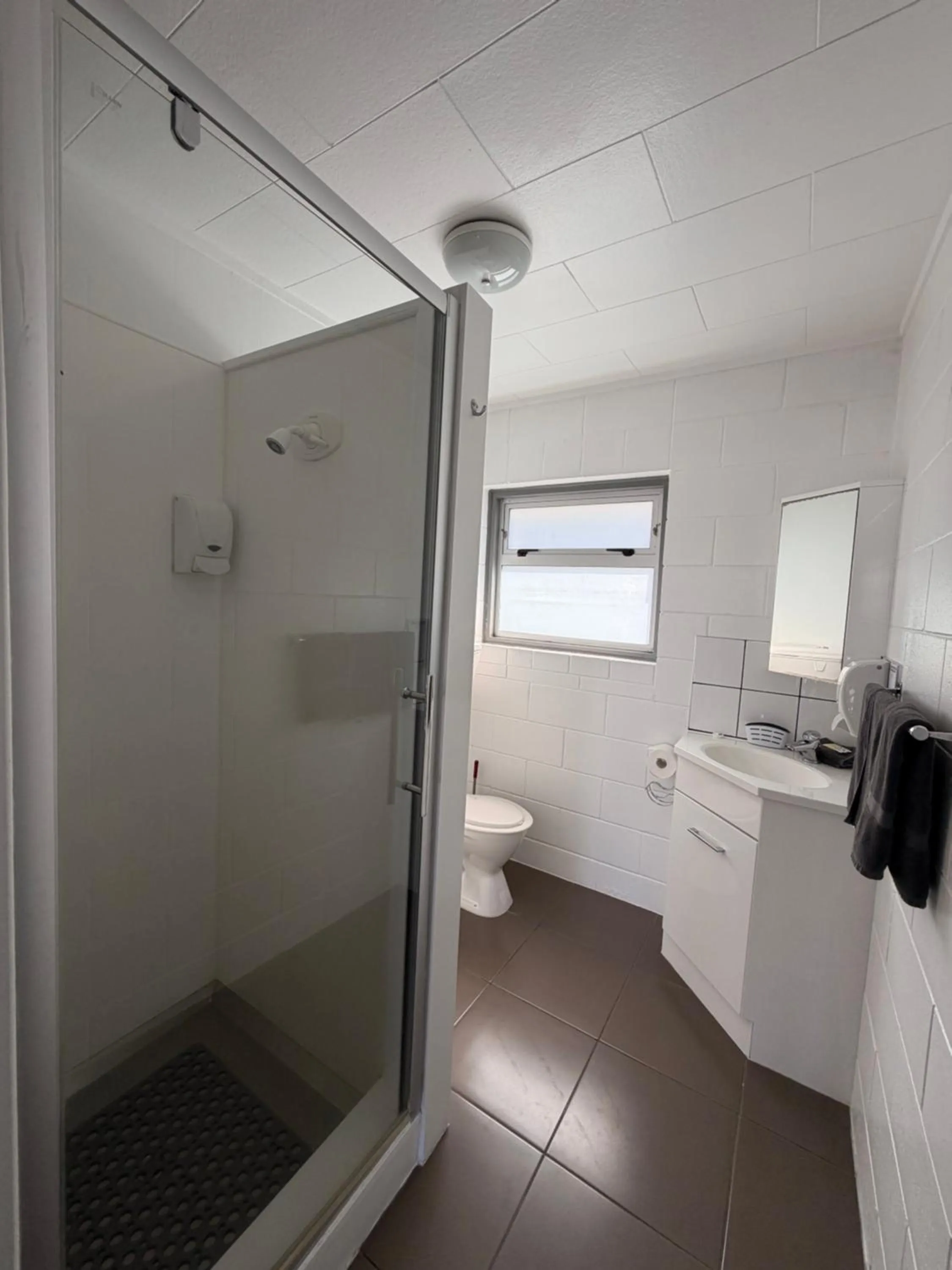 Shower in Central Court Motel