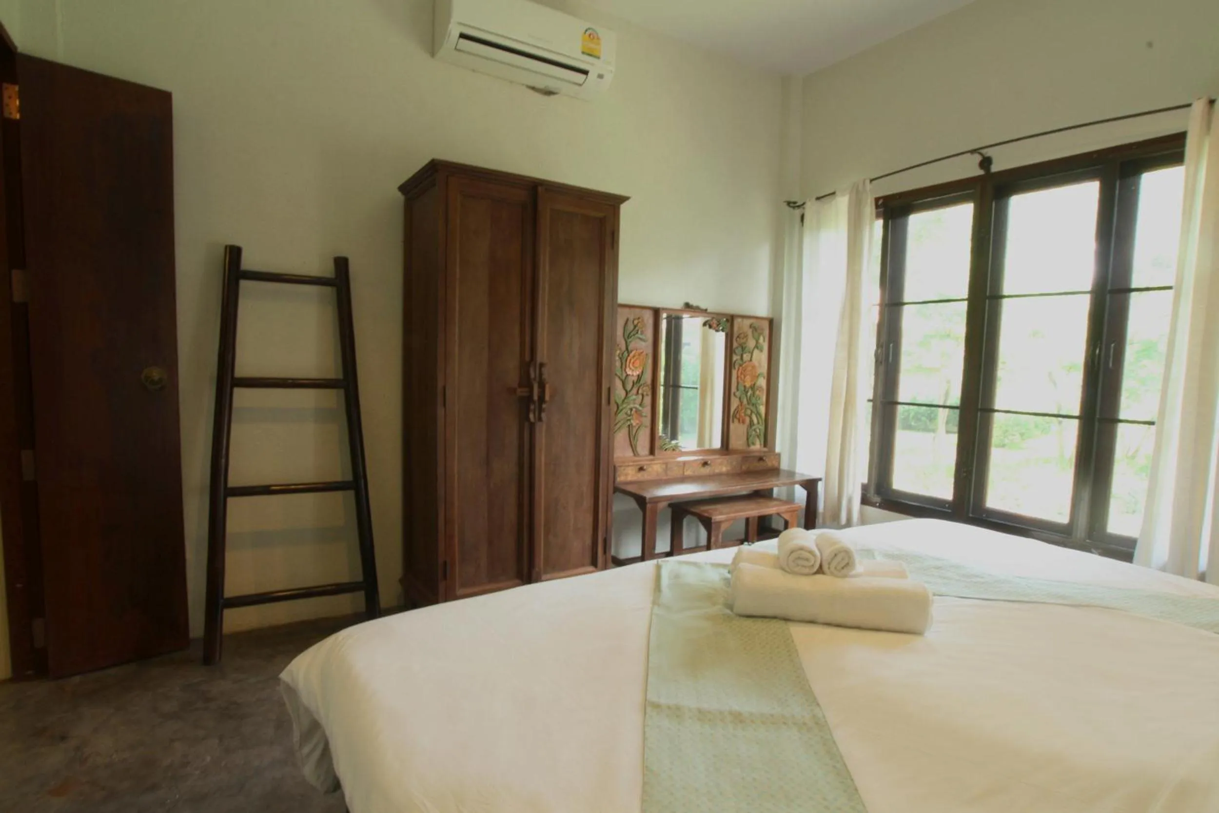 Bed in Jasmine Hills Lodge