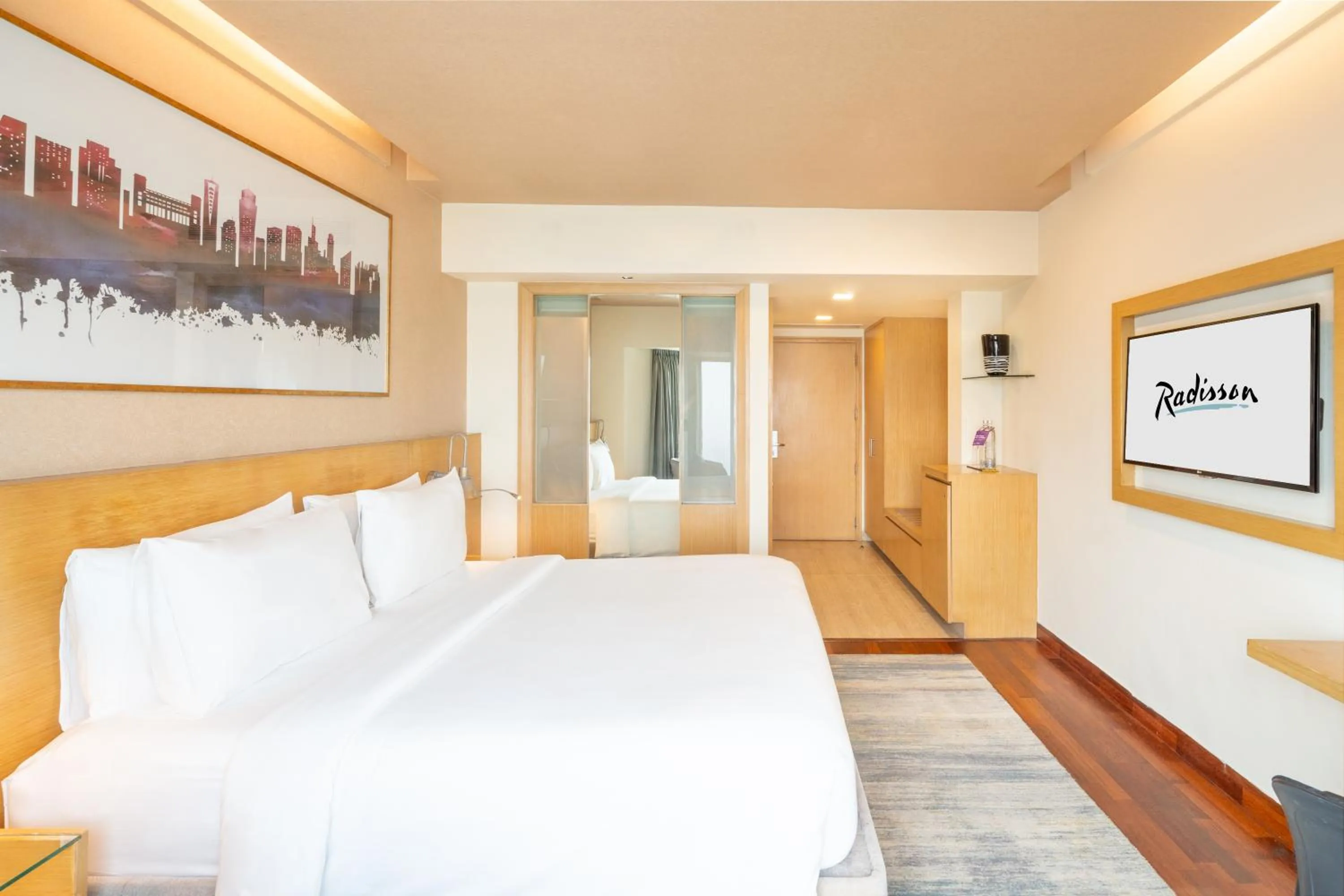 Bedroom, Bed in Radisson Gurugram Sohna Road City Center