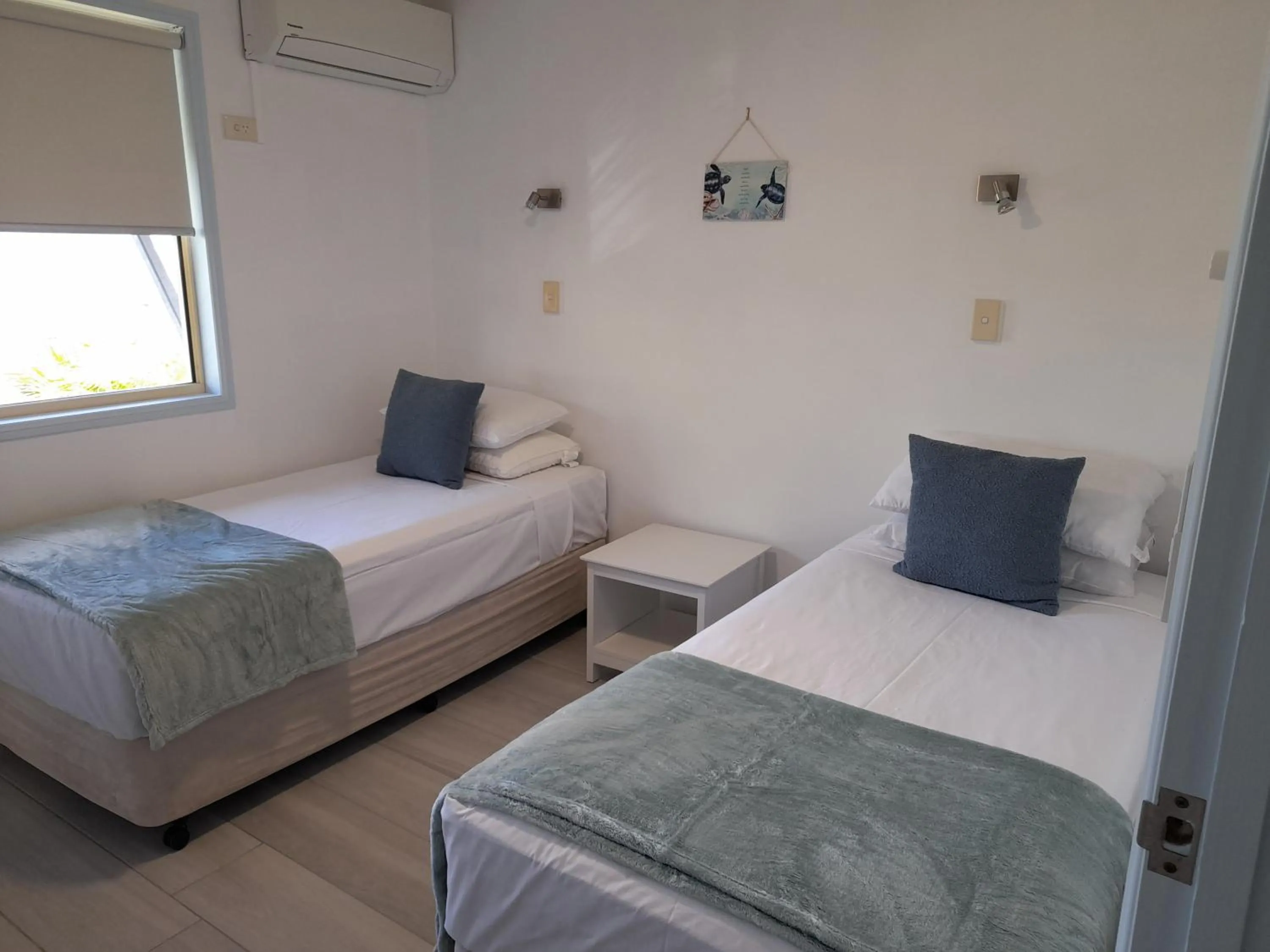 Bed in Airlie Apartments