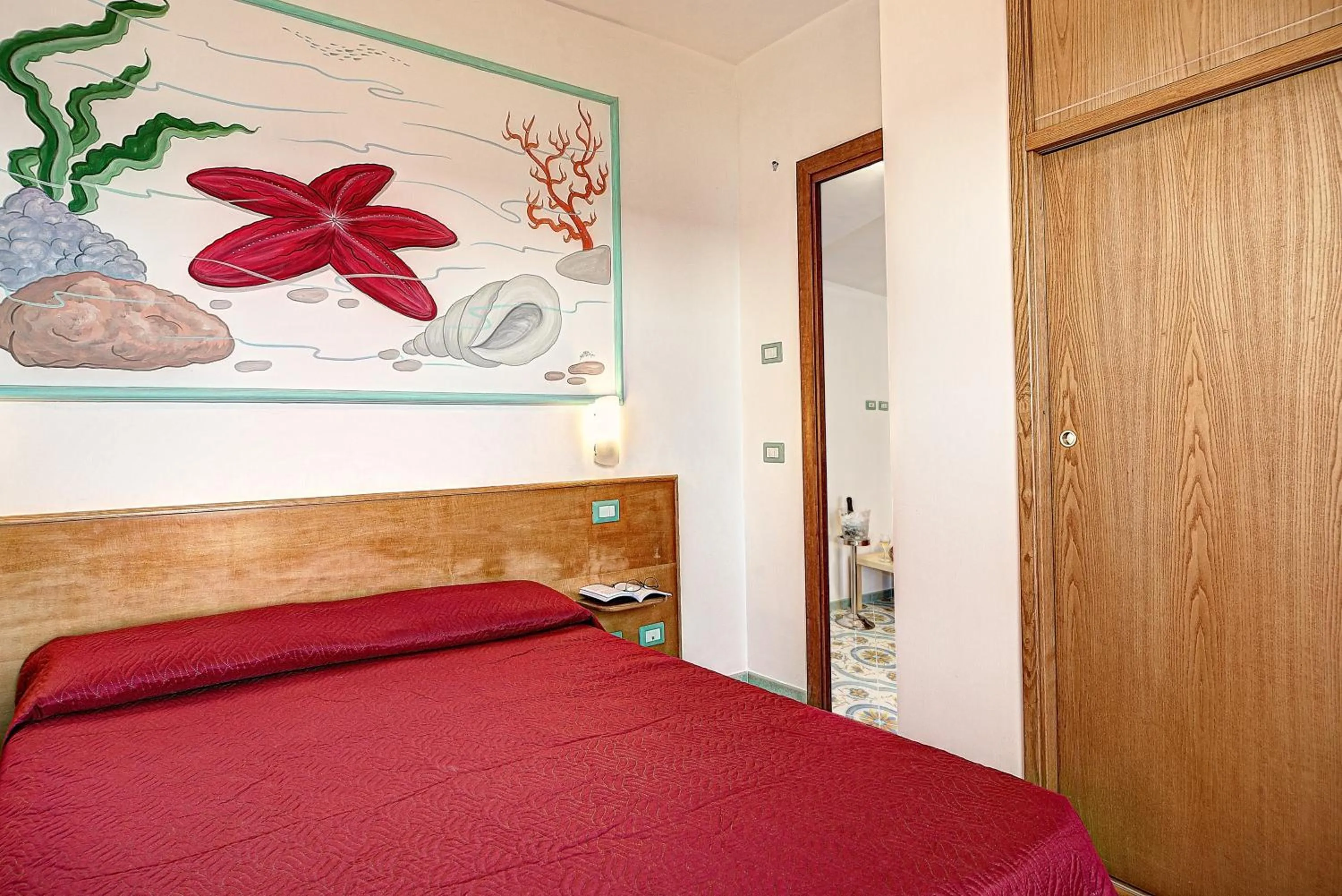 Bed in Belmare Residence on the beach