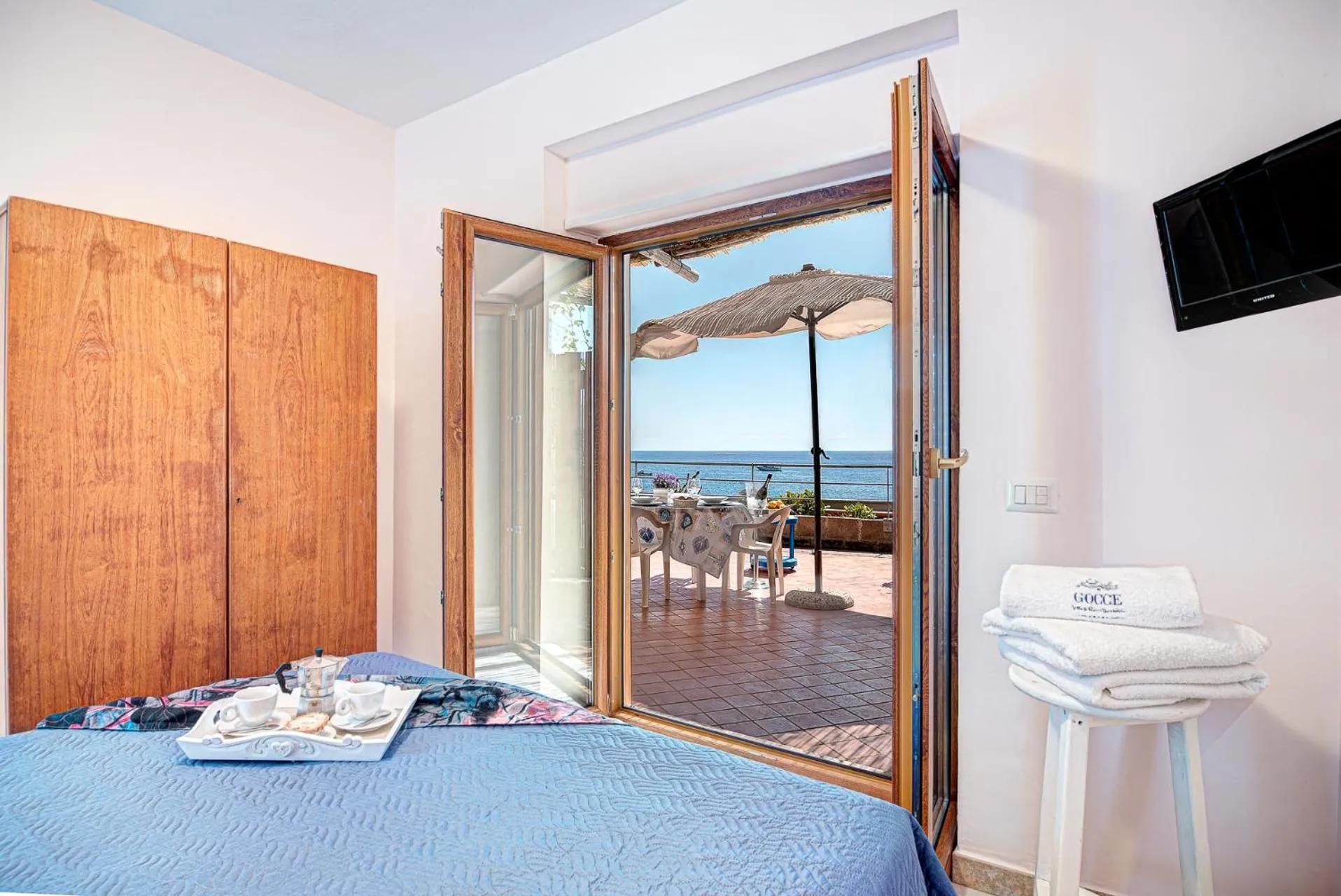 Bed in Belmare Residence on the beach